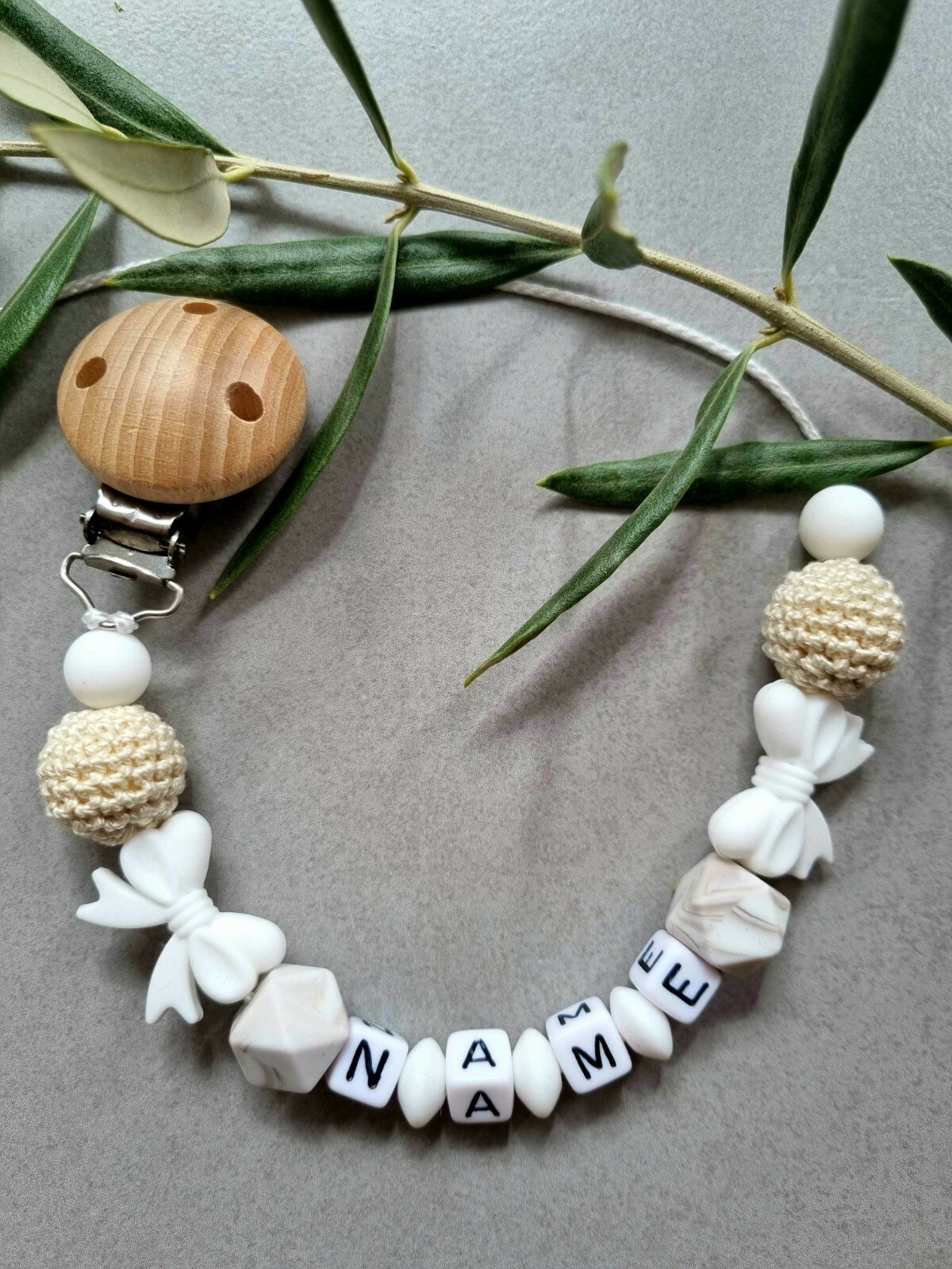 Attache tétine bébé en perle silicone marbré lemon Nœuds