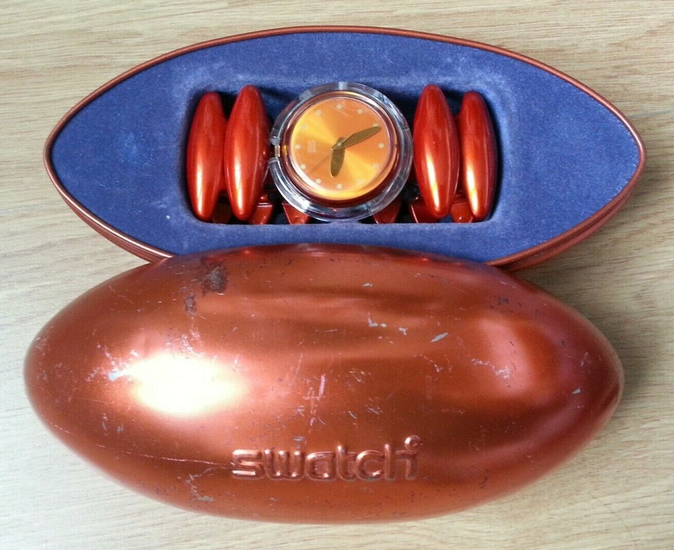 MONTRE FEMME VINTAGE signée SWATCH POP “Neanda Orange” COMME NEUVE avec COFFRET MONTRE FEMME VINTAGE signée SWATCH POP “Neanda Orange” COMME NEUVE avec COFFRET