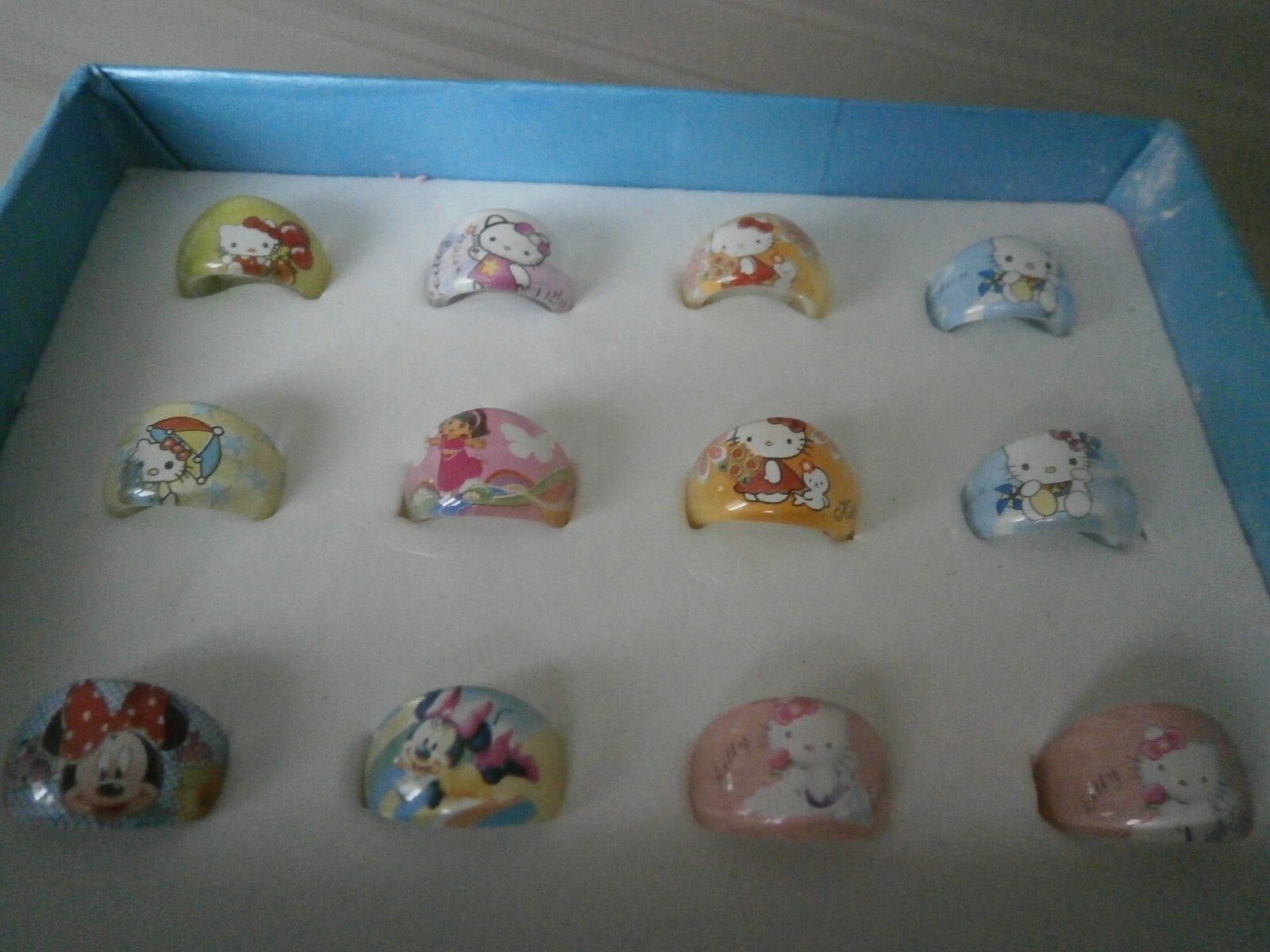 LOT DE 12 BAGUES HELLO KITTY MINNIE DORA BIJOUX FANTAISIE FILLE