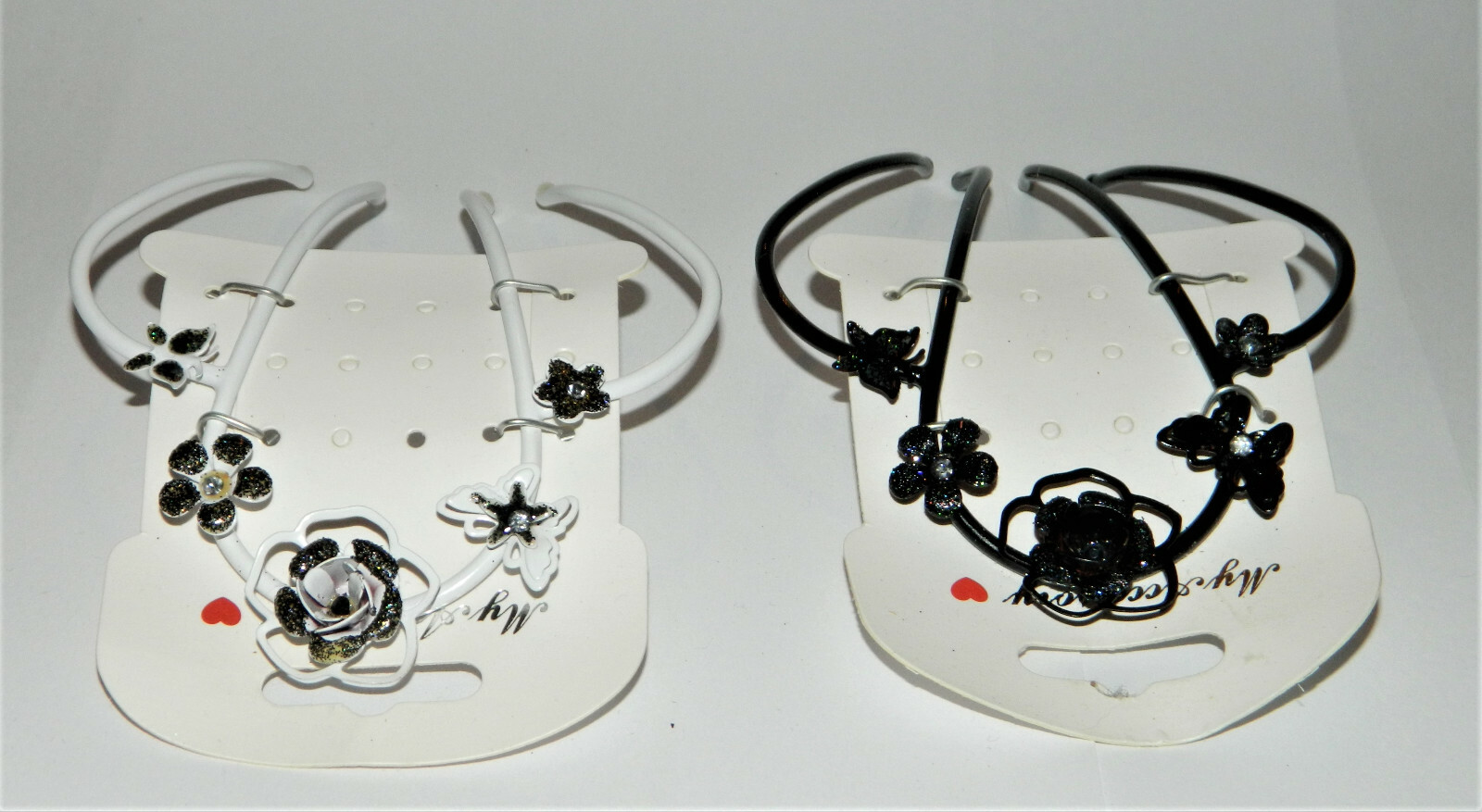 ACCESSOIRES CHEVEUX 2 PEIGNES FLEUR P/F POUR QUEUE DE CHEVAL OU CHIGNON NEUF