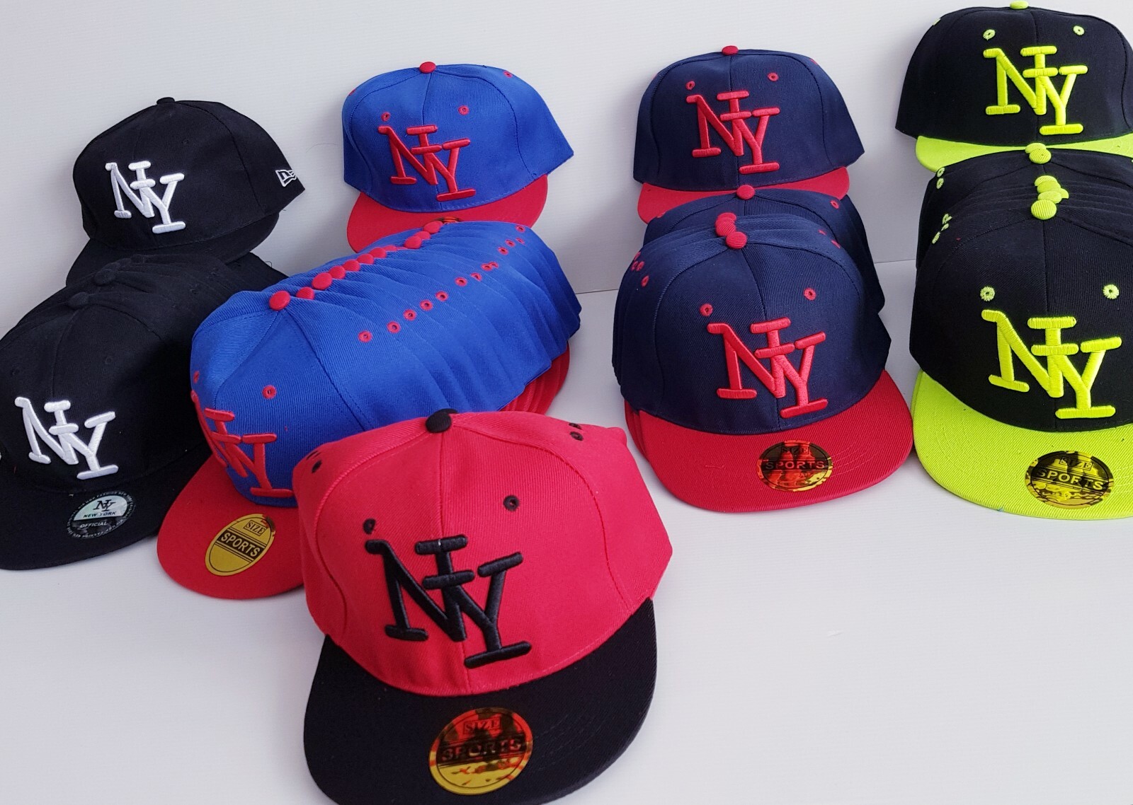 LOT DE 50 CASQUETTES NY NEW YORK NEUF REGLABLE PLUSIEURS COLORIS LOT DE 50 CASQUETTES NY NEW YORK NEUF REGLABLE PLUSIEURS COLORIS
