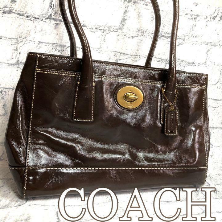 COACH Main Sac Marron Turn Serrure Logo Breloque Femmes De Japon Usé COACH Main Sac Marron Turn Serrure Logo Breloque Femmes De Japon Usé