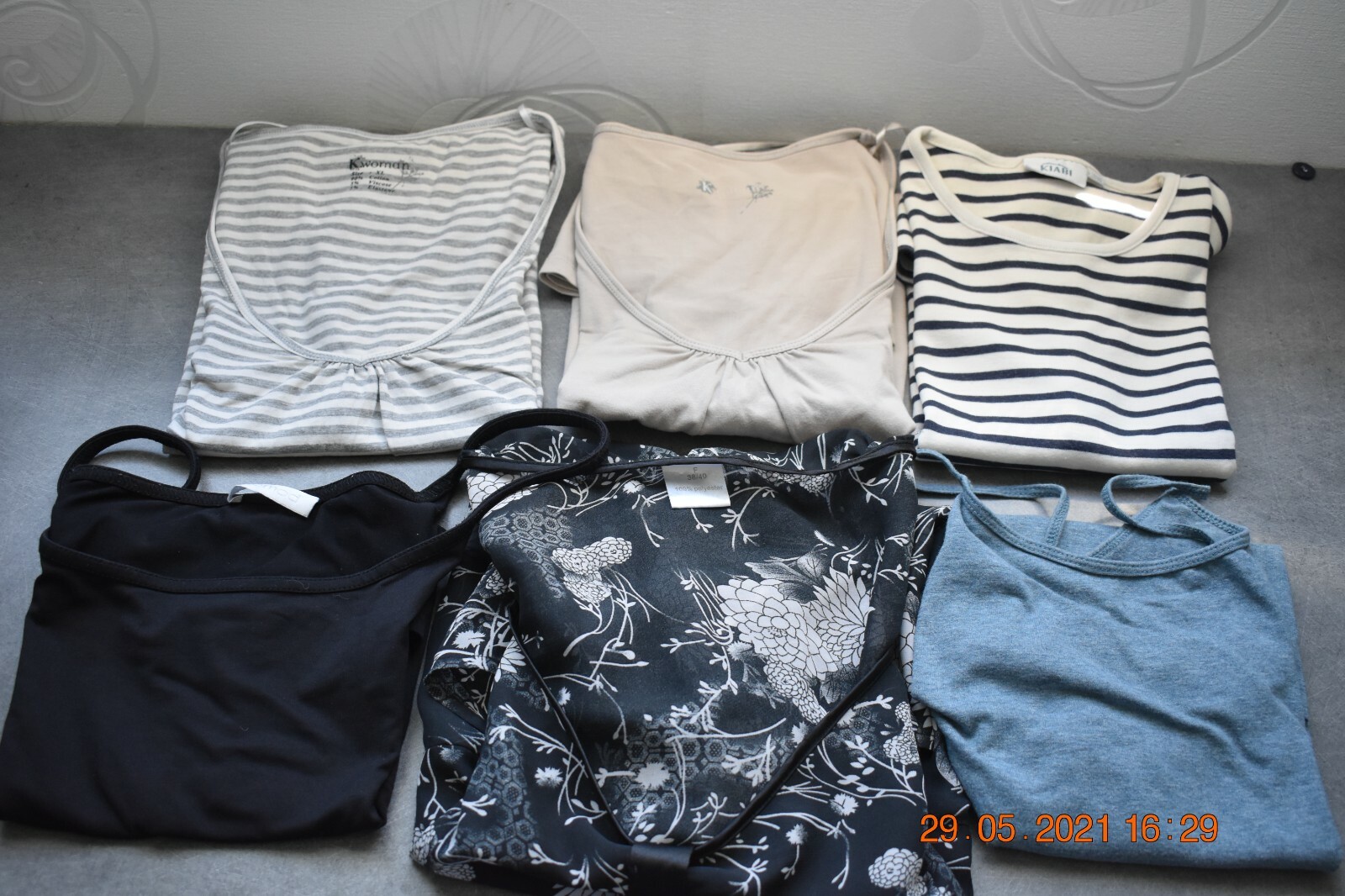 Un lot de 6 vêtements pour femme taille 38/40