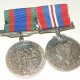 Full Size Silver WWII Canadian Volunteer Service Medal & 1939-1945 WAR MEDAL. Full Size Silver WWII Canadian Volunteer Service Medal & 1939-1945 WAR MEDAL.