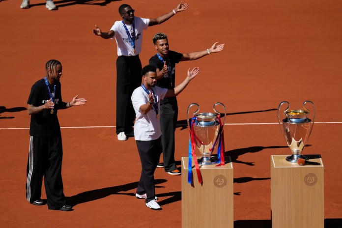PSG stars bring the Champions League trophy to the French Open PSG stars bring the Champions League trophy to the French Open
