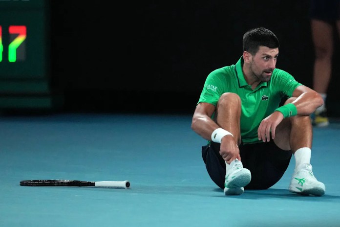 <div>Djokovic secures 400th Grand Slam match win to extend record, ties Federers Australian Open mark</div> <div>Djokovic secures 400th Grand Slam match win to extend record, ties Federer's Australian Open mark</div>
