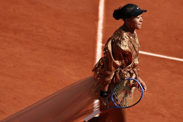 Glittering Osaka edges Jovic to prolong French Open run Glittering Osaka edges Jovic to prolong French Open run