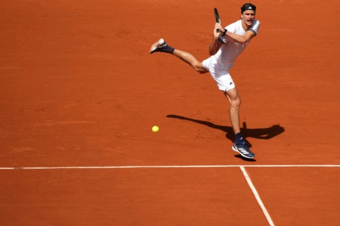 Djokovic fights through tough Roland Garros opener, Zverev strolls Djokovic fights through tough Roland Garros opener, Zverev strolls
