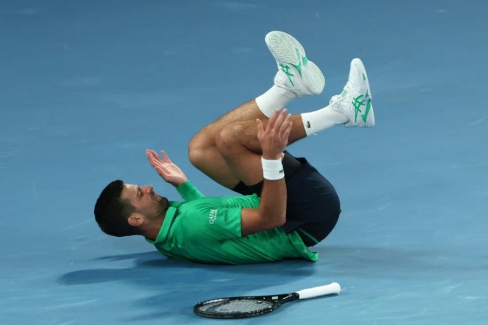 <div>Djokovic hanging in there after landmark 400th Slam win</div> <div>Djokovic 'hanging in there' after landmark 400th Slam win</div>