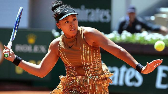 Osaka sparkles in golden French Open outfit Osaka sparkles in golden French Open outfit