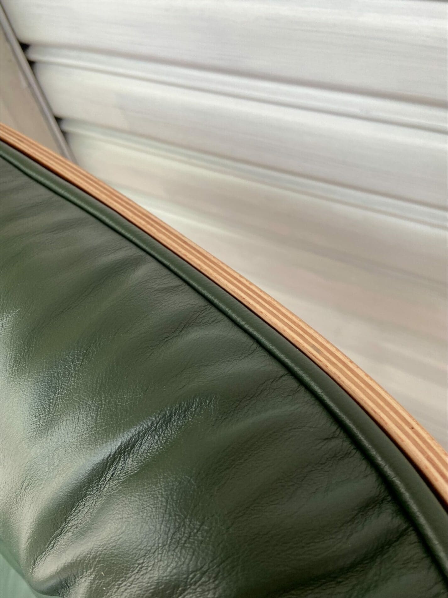 Charles EAMES – Lounge chair et ottoman d’occasion – cuir vert et palissandre