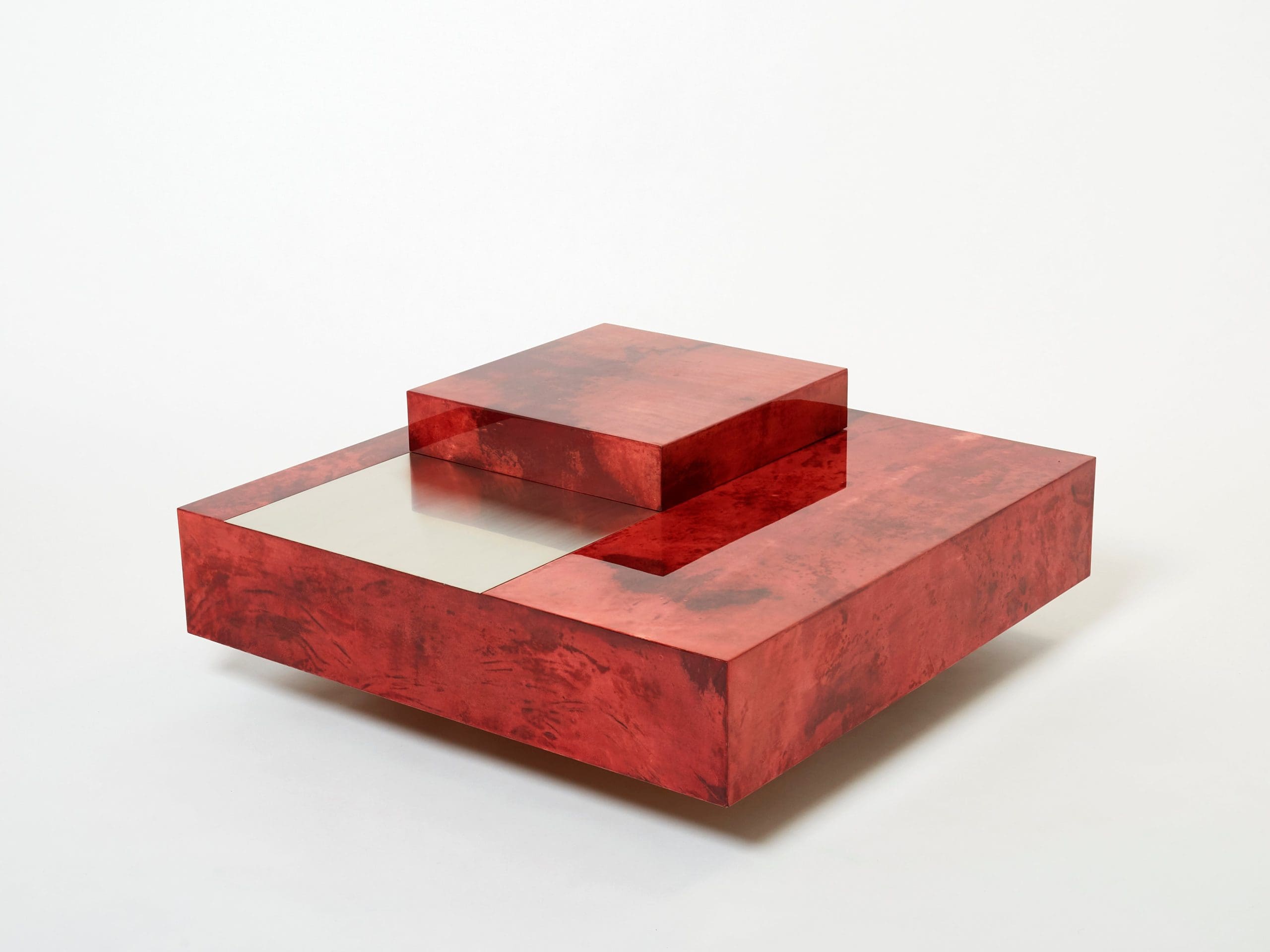 Table basse Aldo Tura en parchemin de chèvre rouge cerise et acier, années 1960