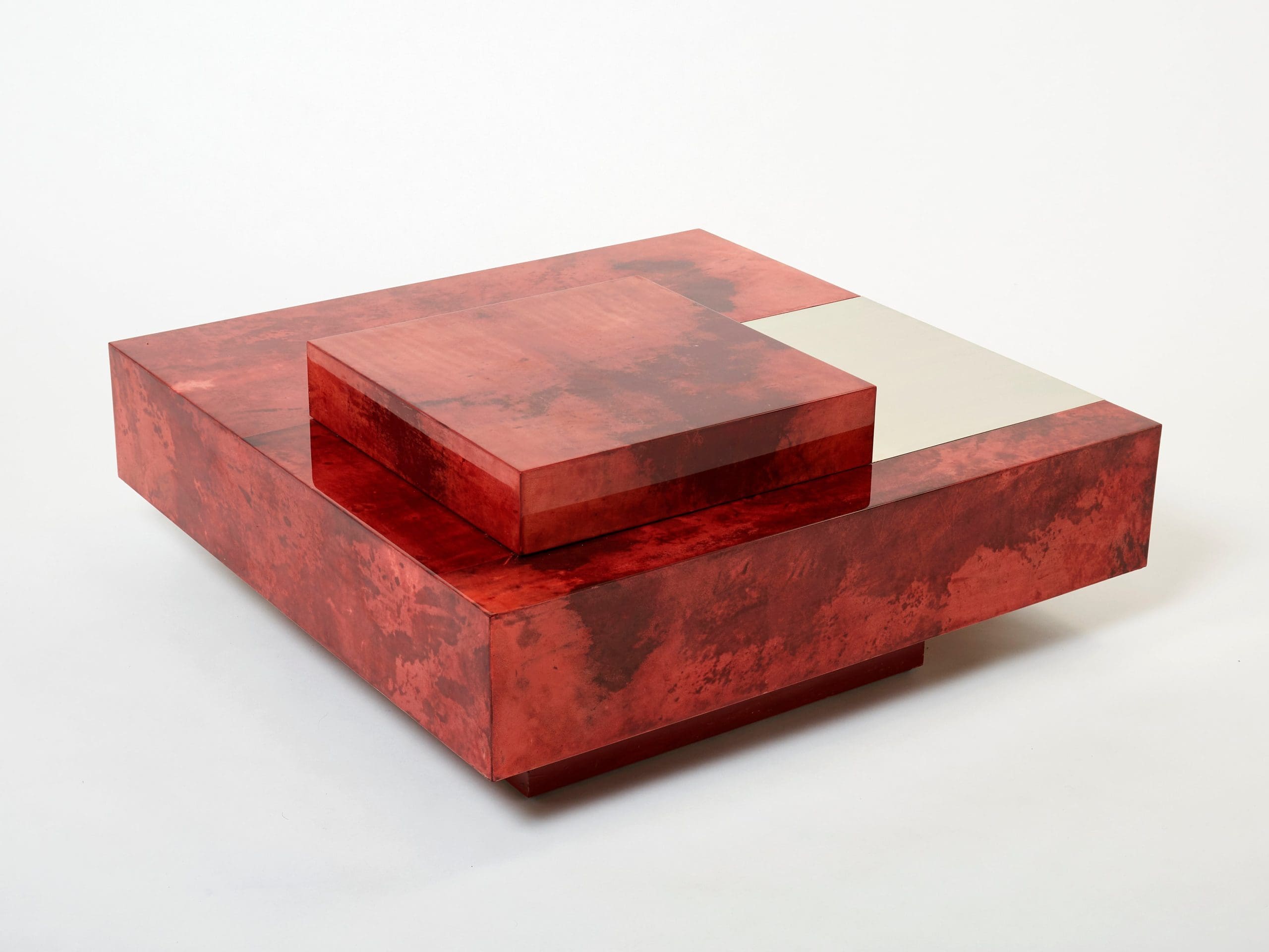 Table basse Aldo Tura en parchemin de chèvre rouge cerise et acier, années 1960
