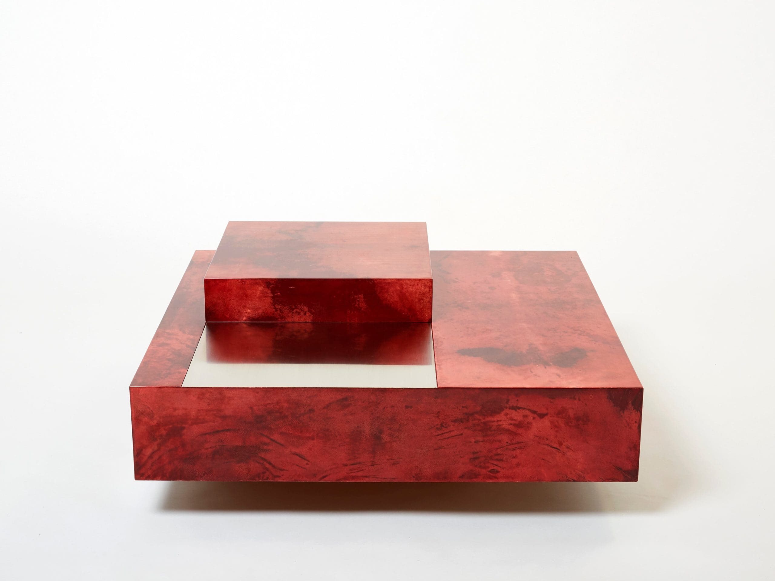 Table basse Aldo Tura en parchemin de chèvre rouge cerise et acier, années 1960