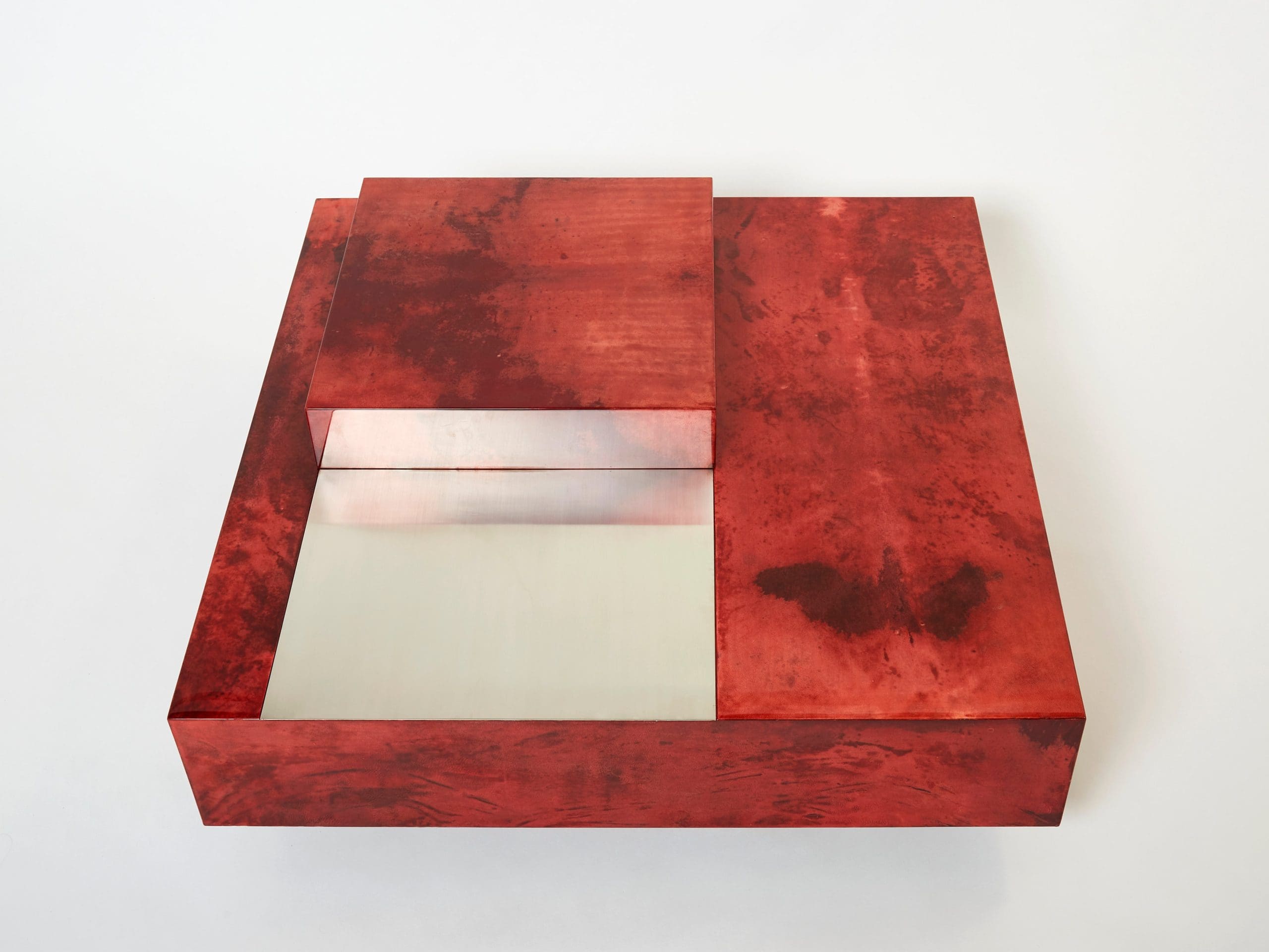 Table basse Aldo Tura en parchemin de chèvre rouge cerise et acier, années 1960