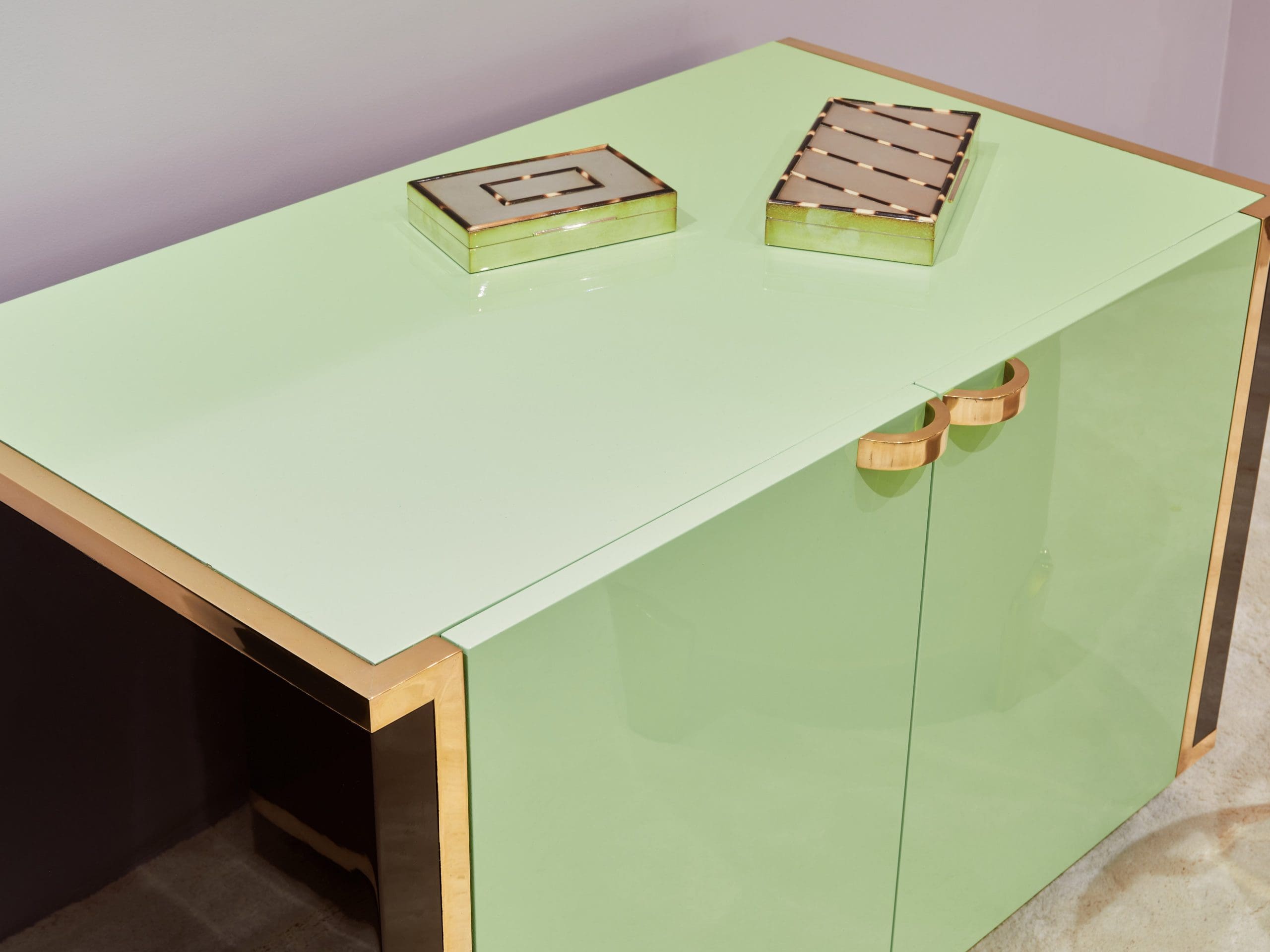 J.C. Mahey pair of small green lacquer and brass cabinets 1970s