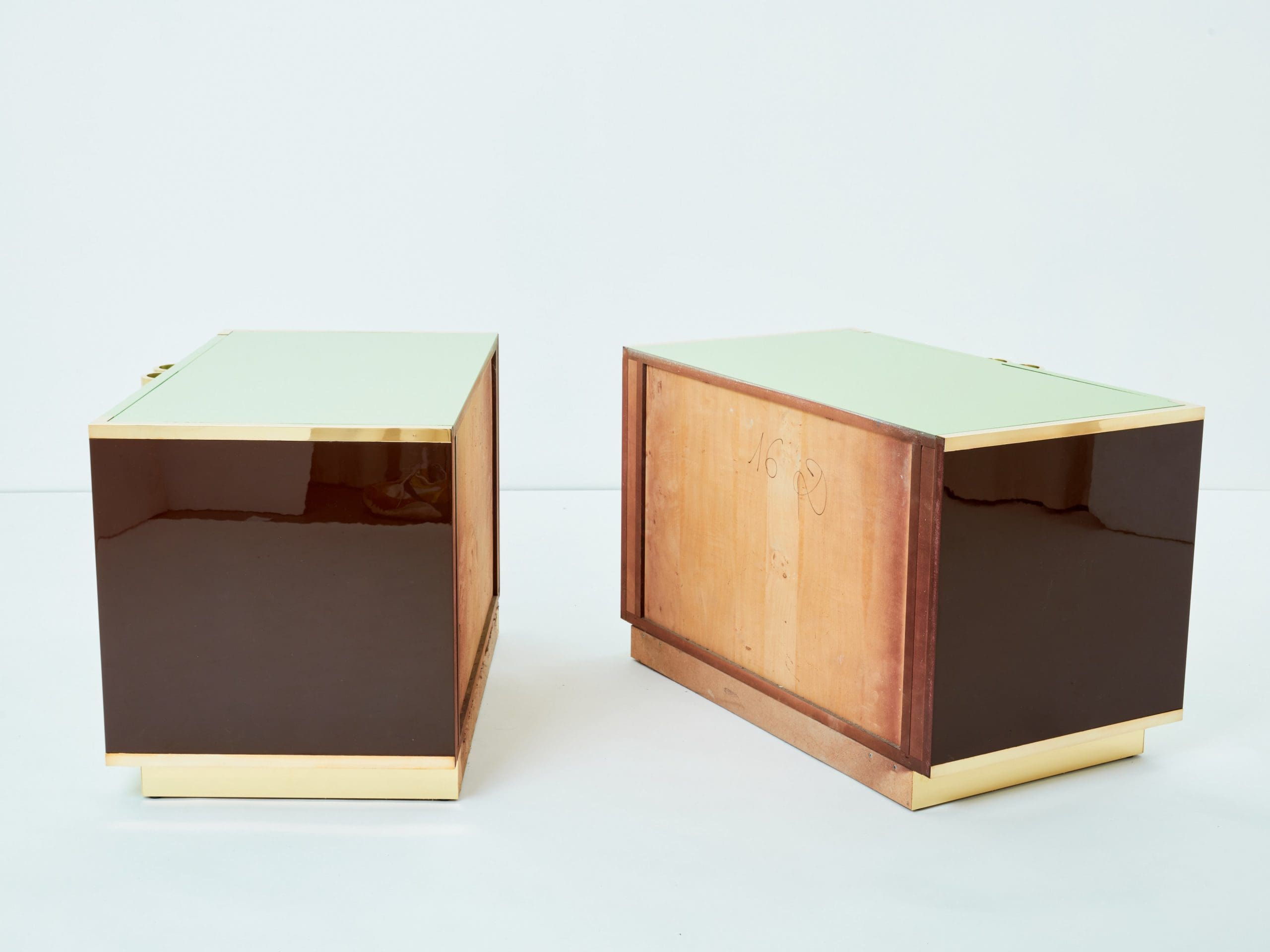 J.C. Mahey pair of small green lacquer and brass cabinets 1970s