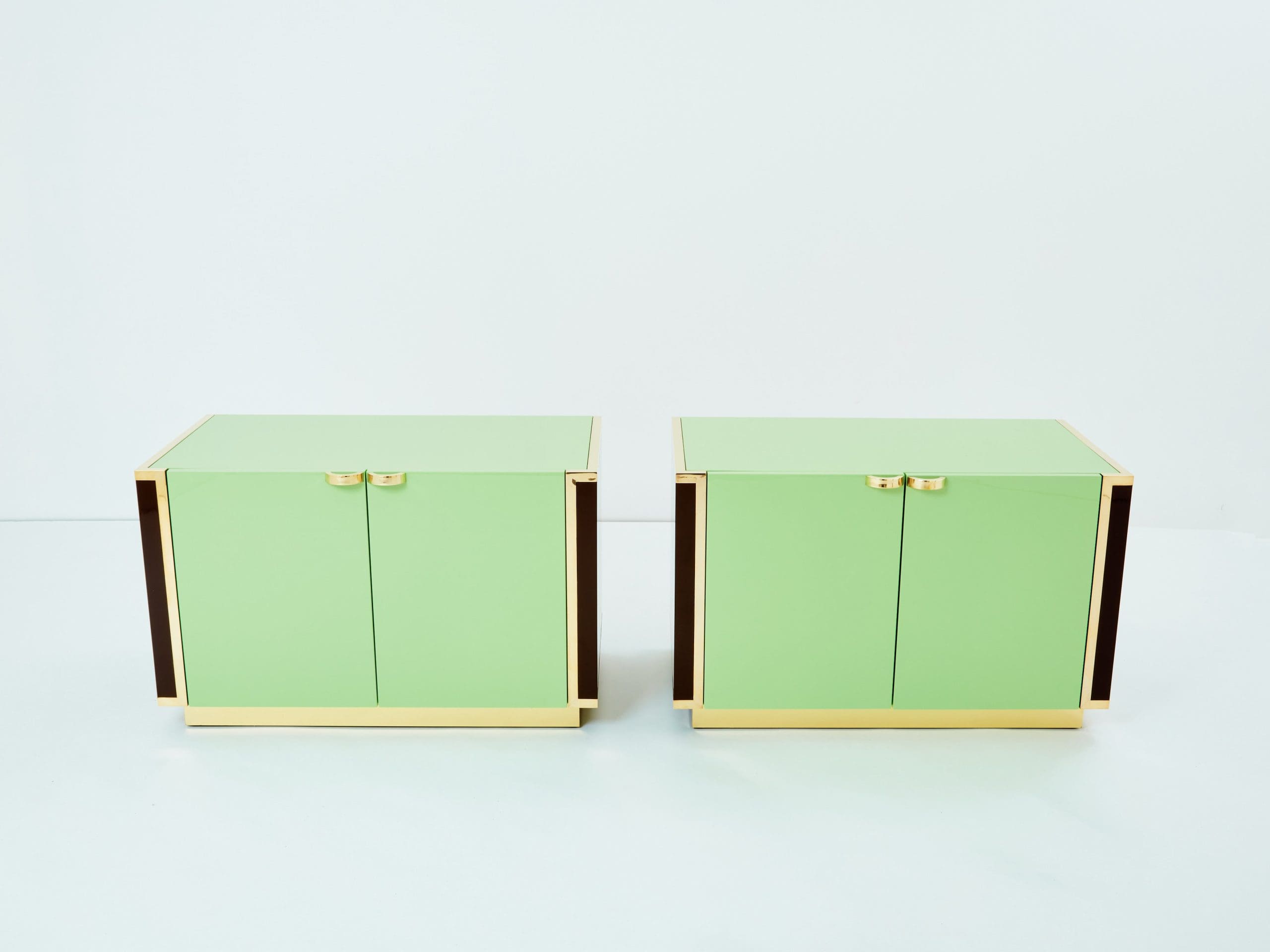 J.C. Mahey pair of small green lacquer and brass cabinets 1970s