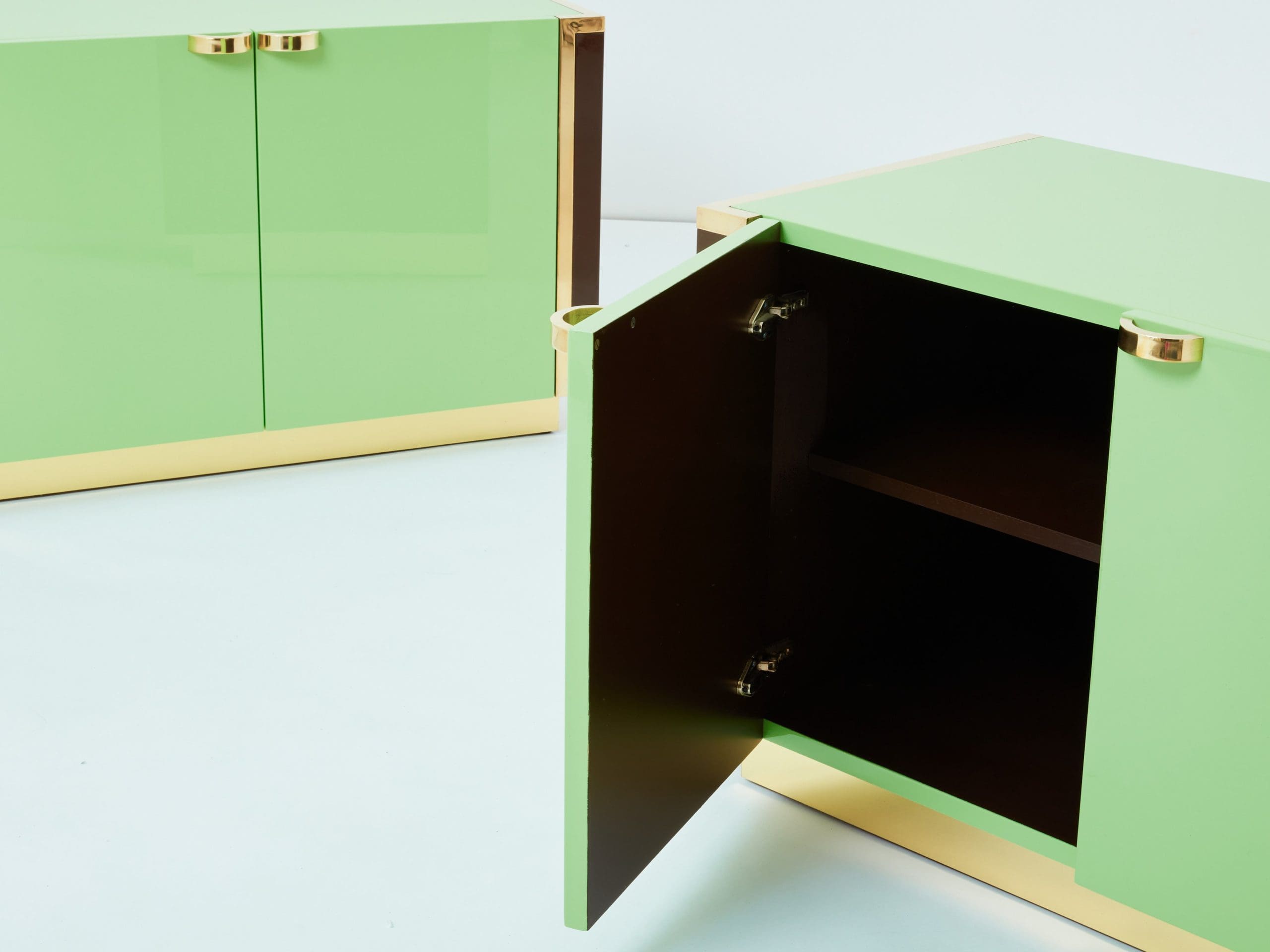 J.C. Mahey pair of small green lacquer and brass cabinets 1970s