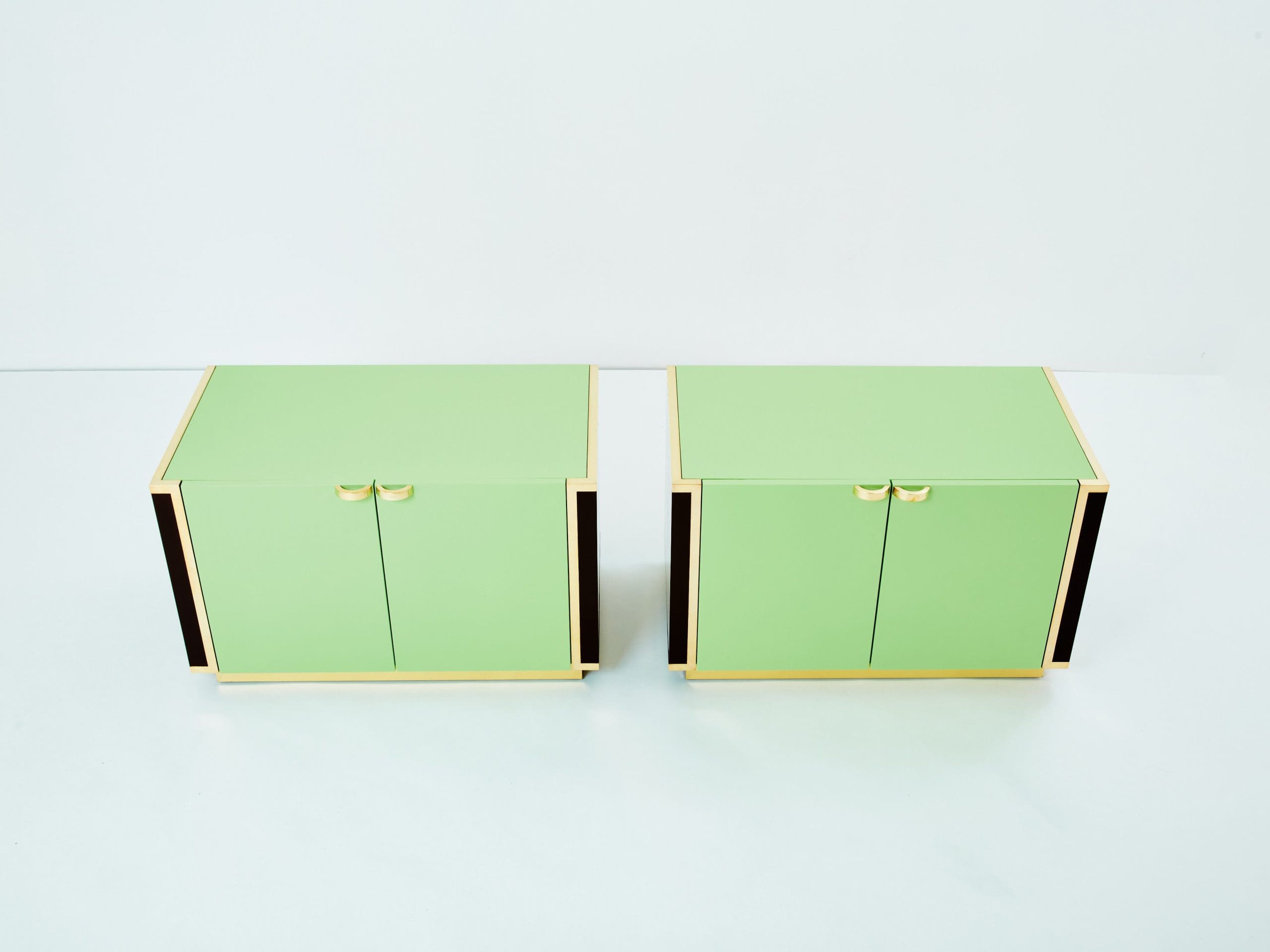 J.C. Mahey pair of small green lacquer and brass cabinets 1970s