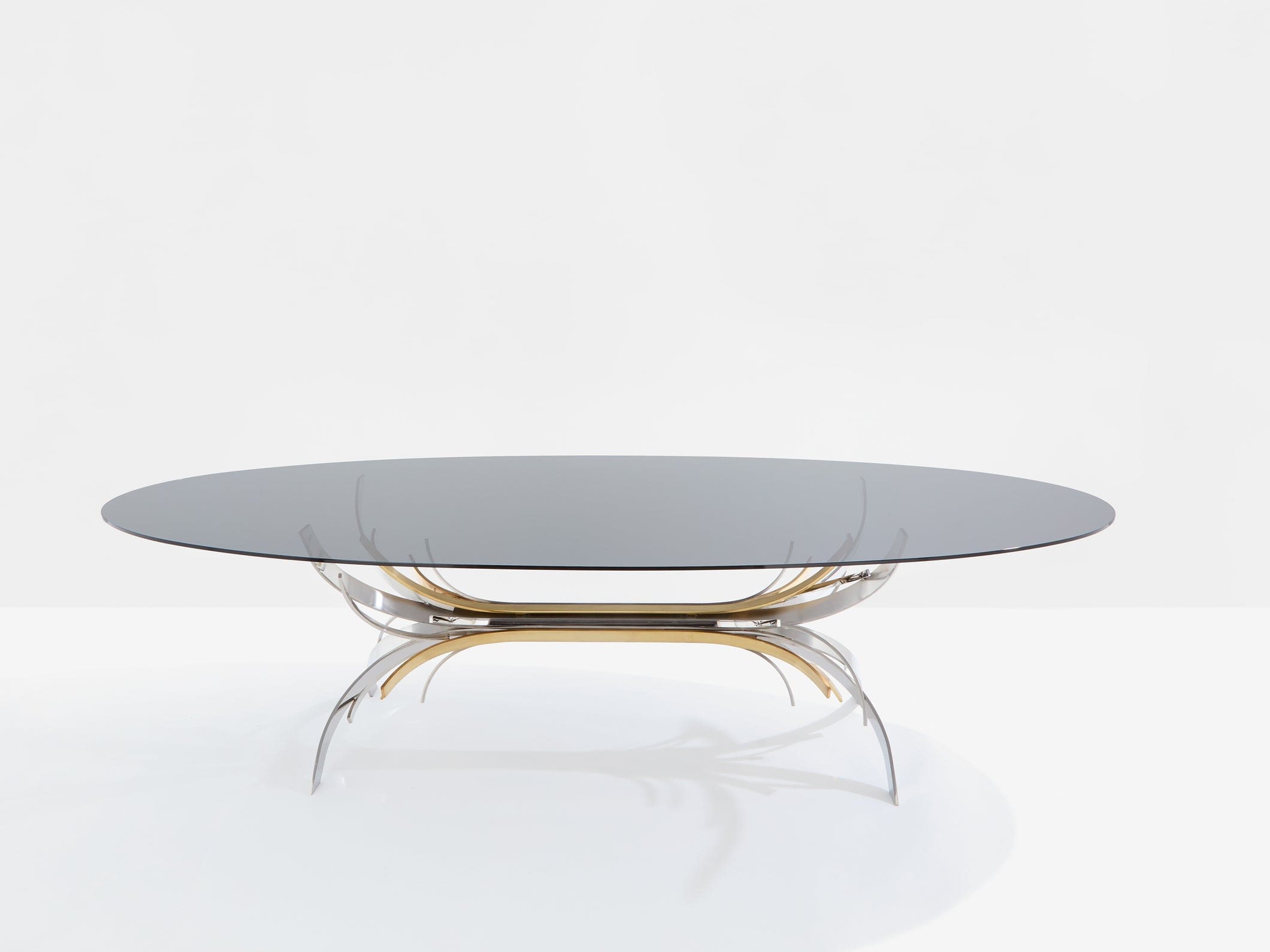 Table Maria Pergay « Gerbe » en acier, laiton et verre fumé – France 1970