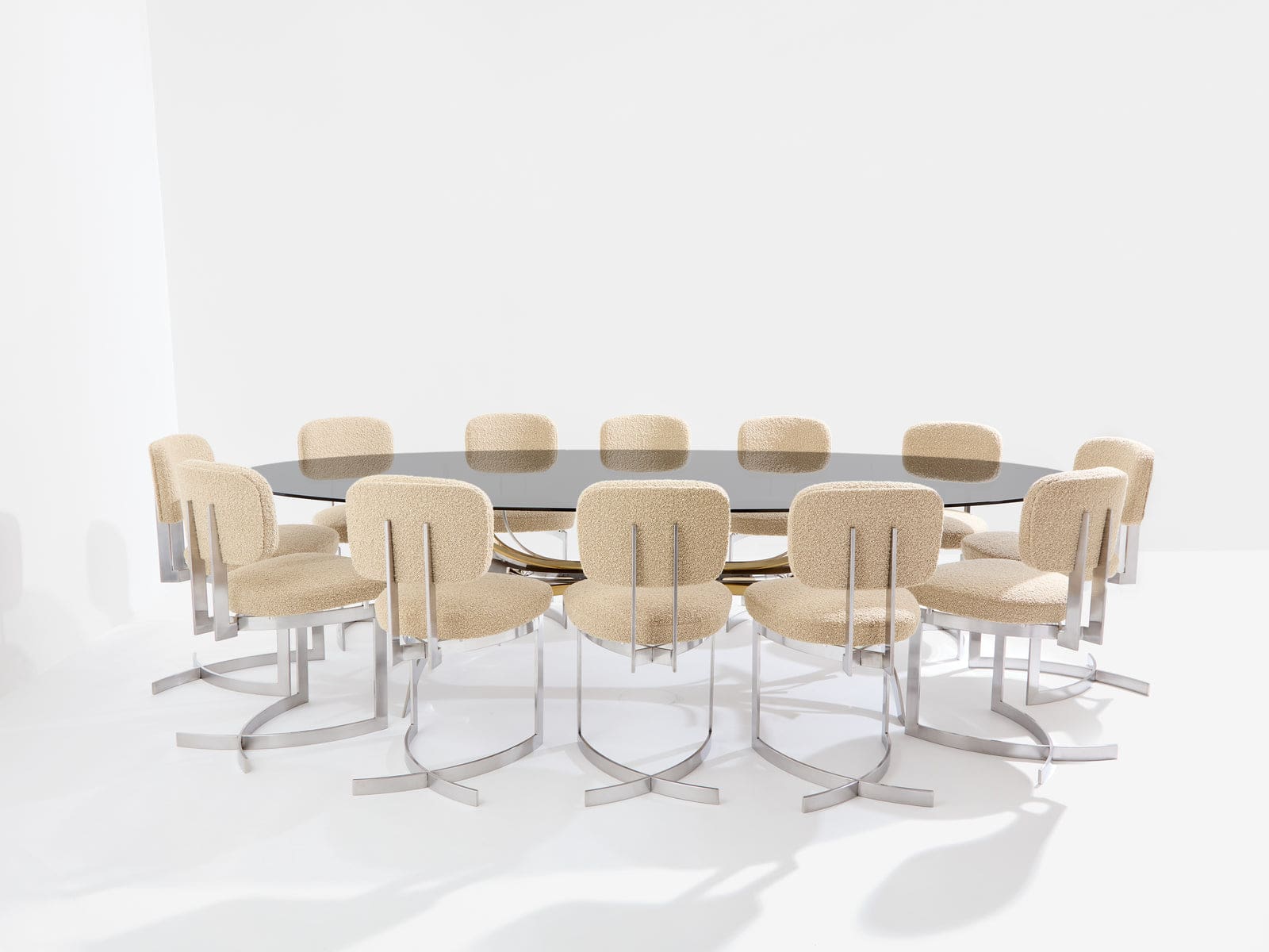 Table Maria Pergay « Gerbe » en acier, laiton et verre fumé – France 1970