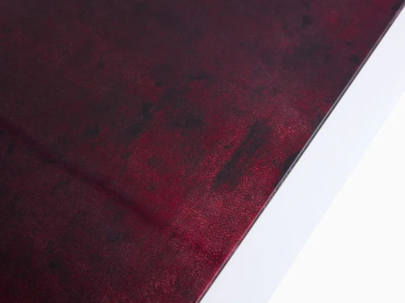Table basse Aldo Tura en parchemin bourgogne – Design italien des années 60