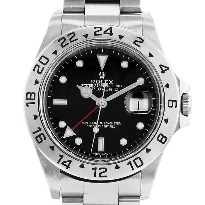 Montre Rolex Explorer II Ref. 16570 en acier inoxydable, cadran noir, lunette graduée 24h, complication GMT, bracelet Oyster, modèle emblématique de 1999.