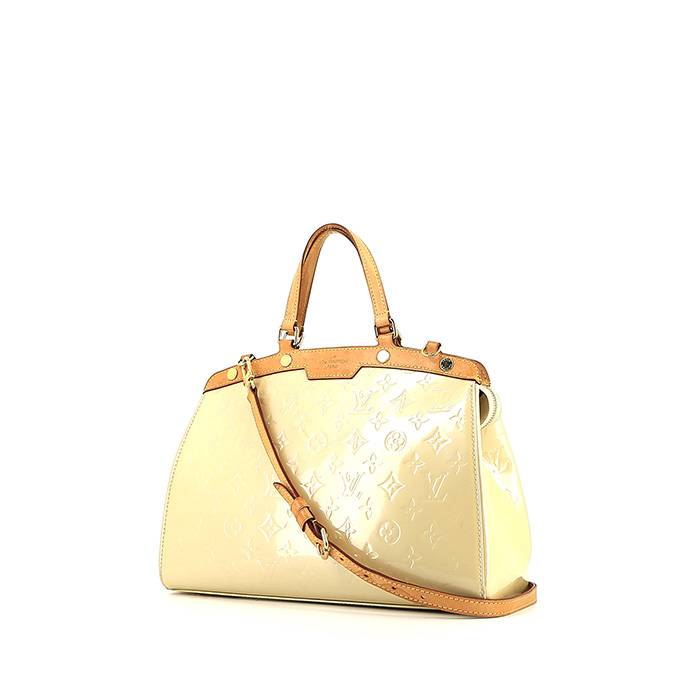 Sac à main Louis Vuitton Brea en cuir verni crème et cuir naturel