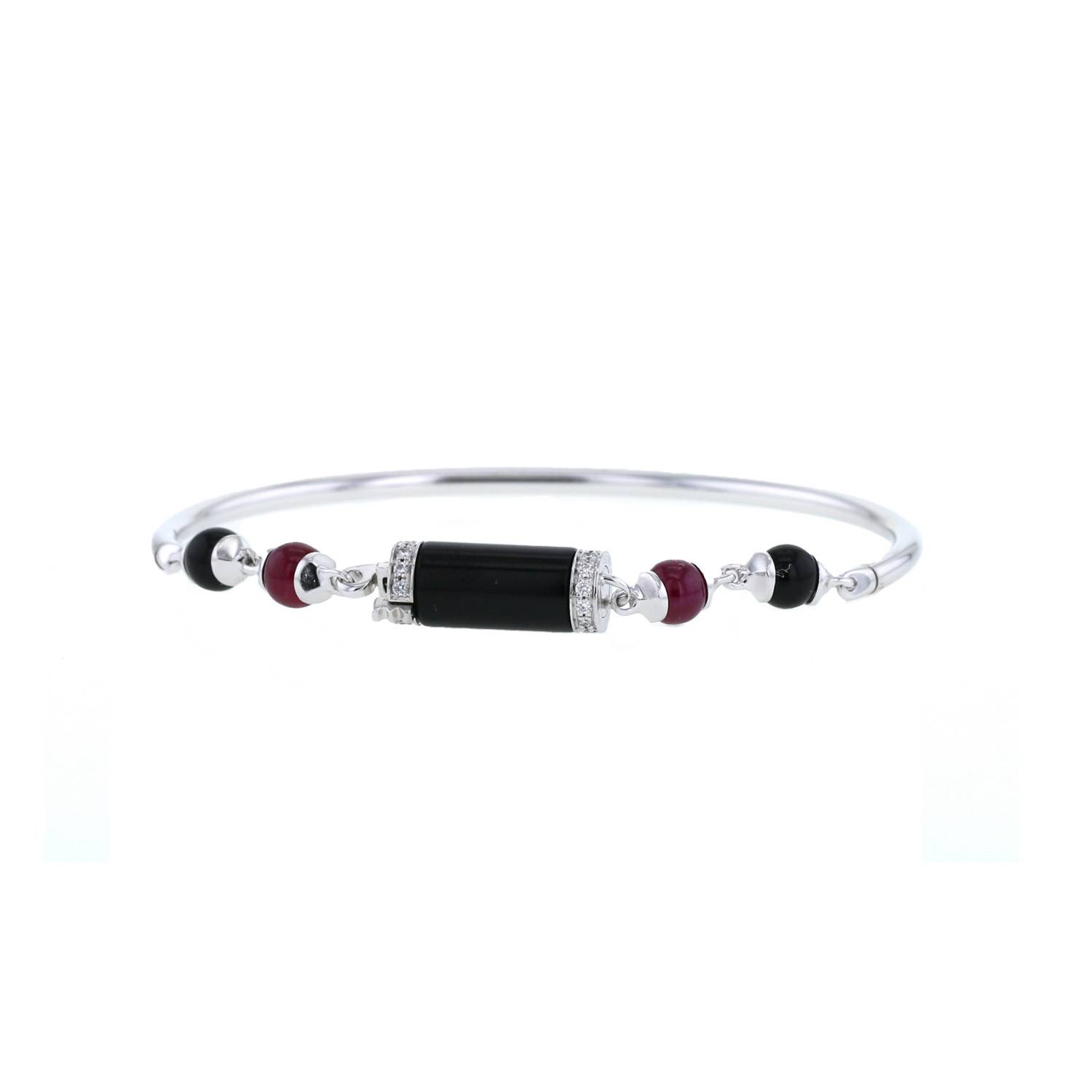 Bracelet Cartier Le Baiser du Dragon en or blanc, onyx et rubis