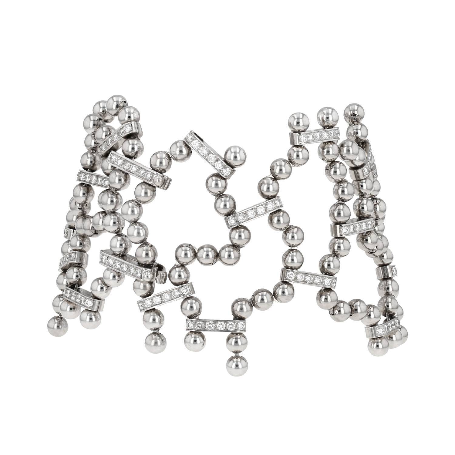 Bracelet manchette souple Cartier Perles de Diamants en or blanc et