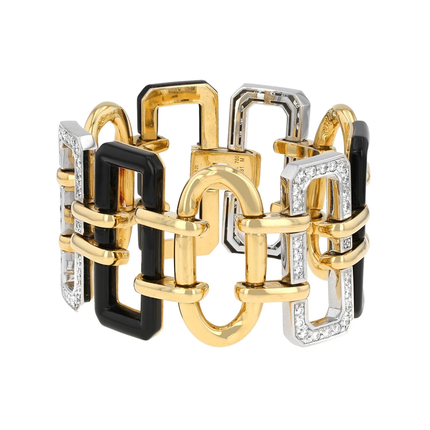 Bracelet Chanel Première en or jaune, onyx et diamants, maillons géométriques, style Art Déco, signé Chanel.
