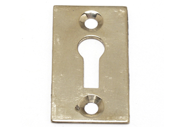 Escutcheon Oblong/Flat Brass 35X19mm #91