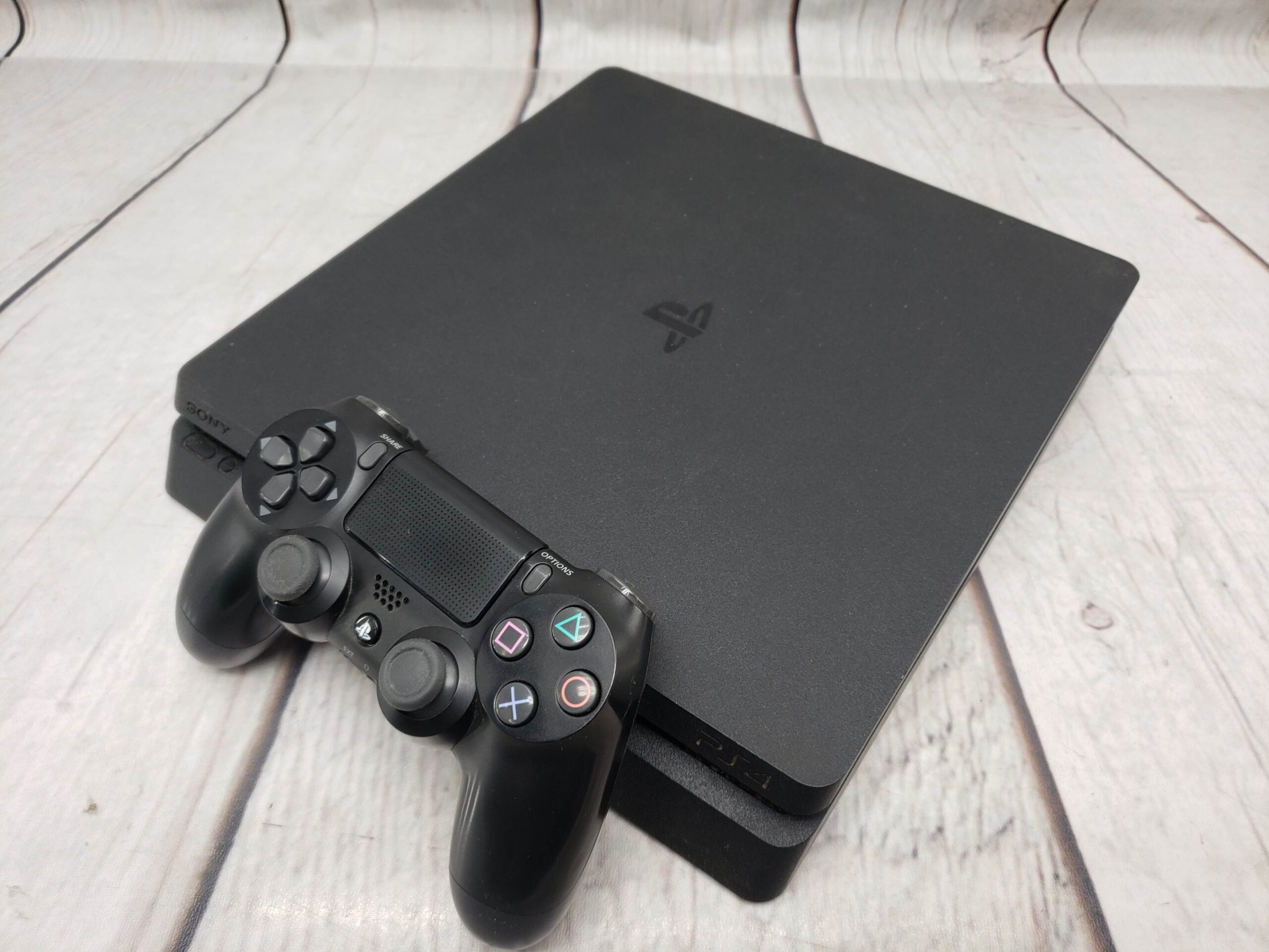 Sony PS4 Slim 1TB w/ one controller, power supply, cords, good condition
