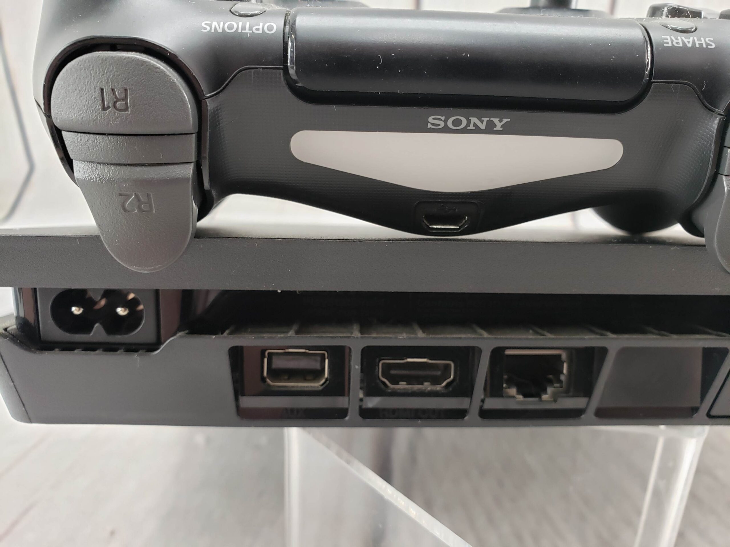 Sony PS4 Slim 1TB w/ one controller, power supply, cords, good condition