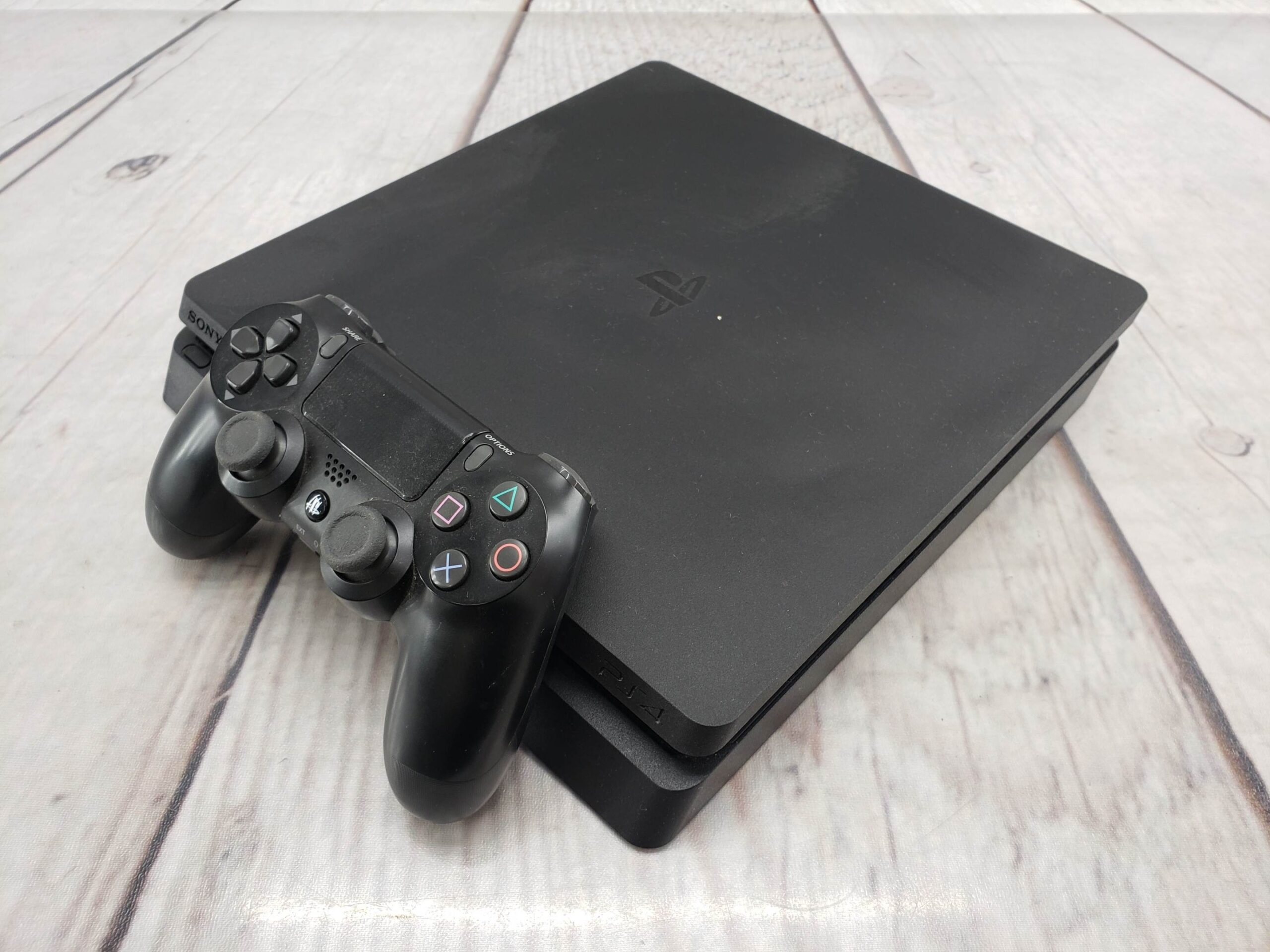 Sony PS4 Slim 1TB w/ one controller, power supply, cords, good condition