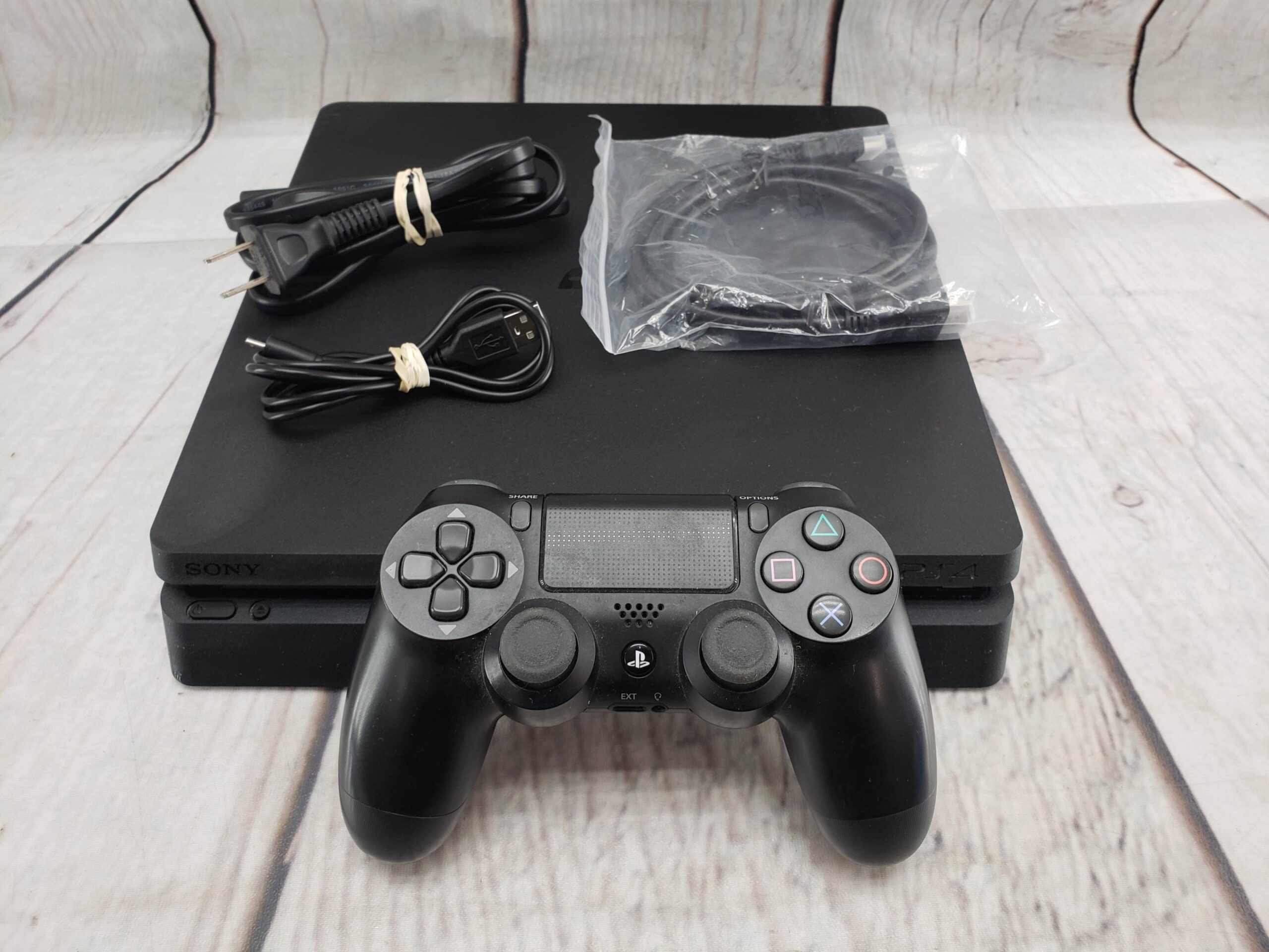 Sony PS4 Slim 1TB w/ one controller, power supply, cords, good condition