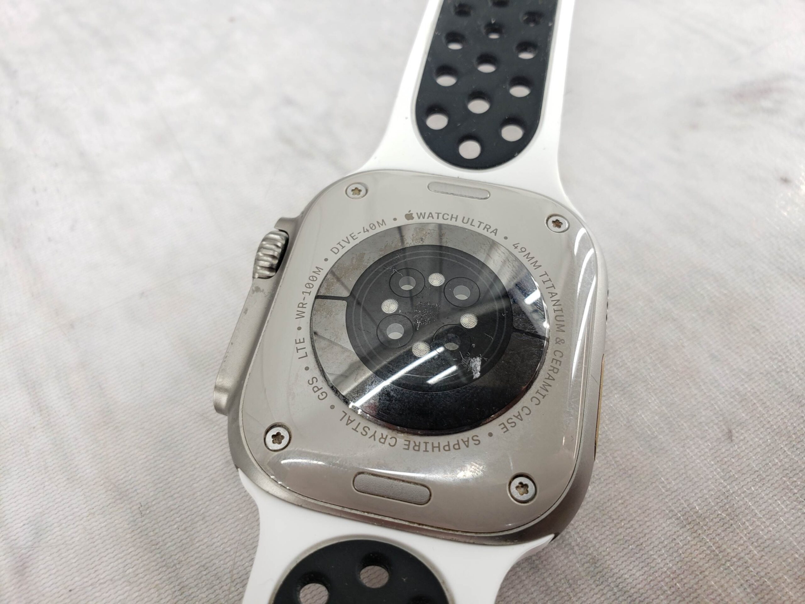 Apple Watch Ultra (GPS + Cellular), 49mm, Titanium and Ceramic, White & Black Band,