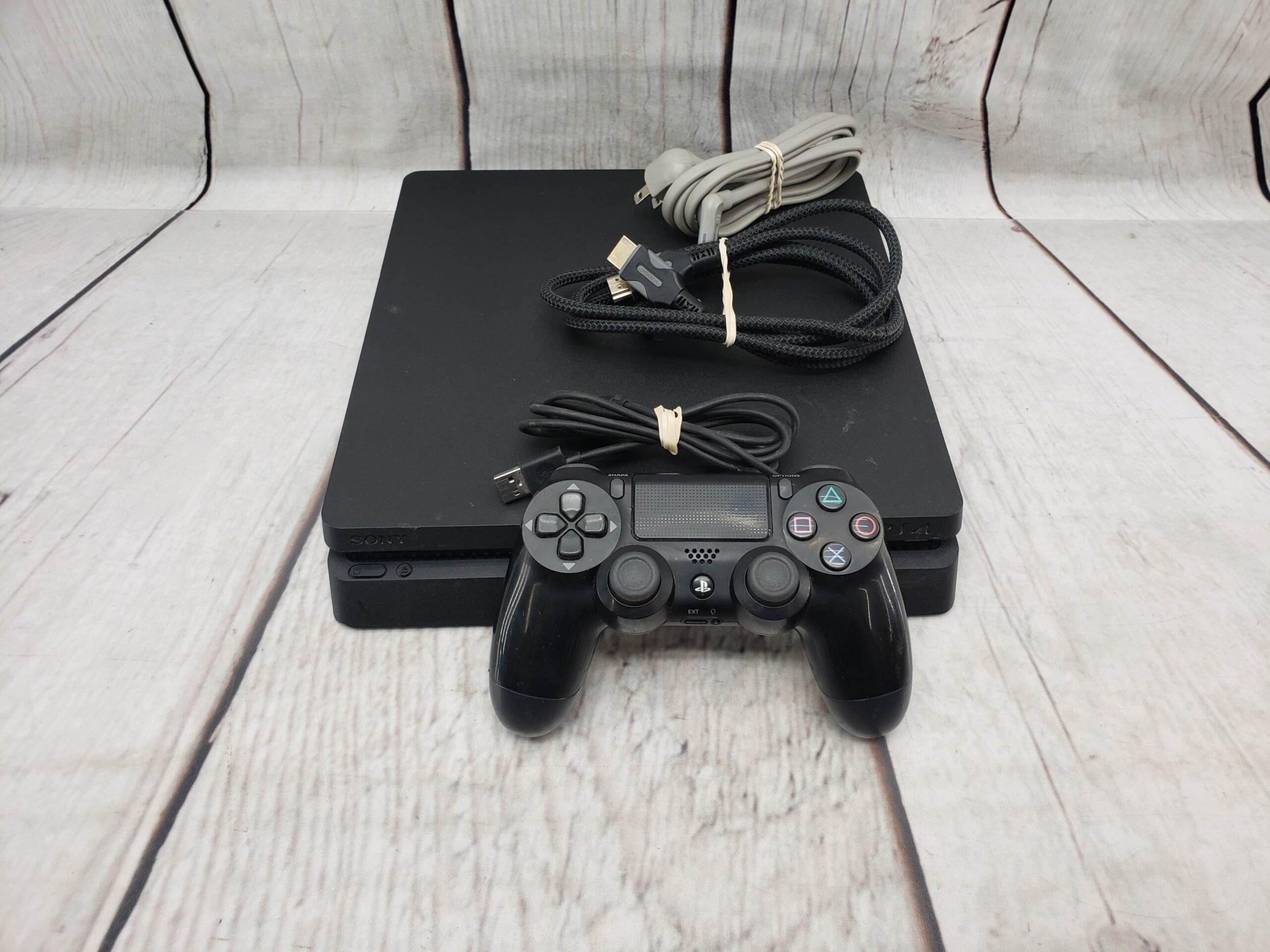 Sony PS4 Slim 1TB w/ one controller, power supply, cords, good condition