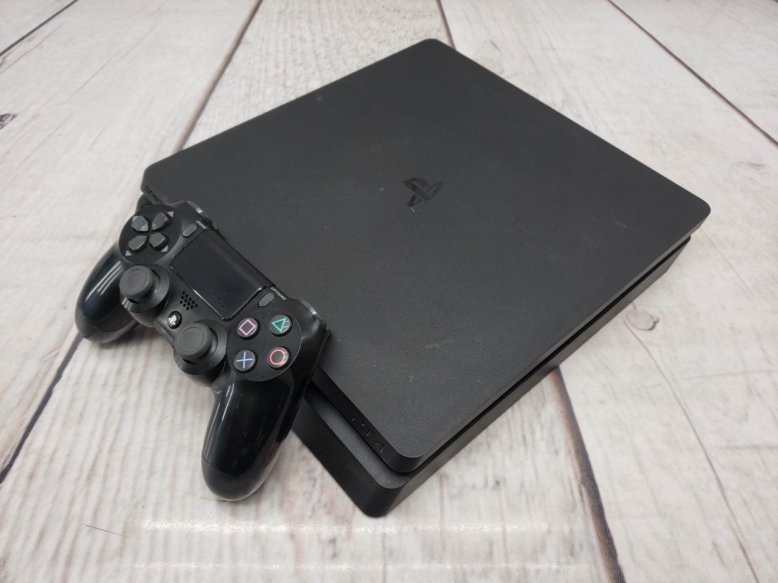 Sony PS4 Slim 1TB w/ one controller, power supply, cords, good condition