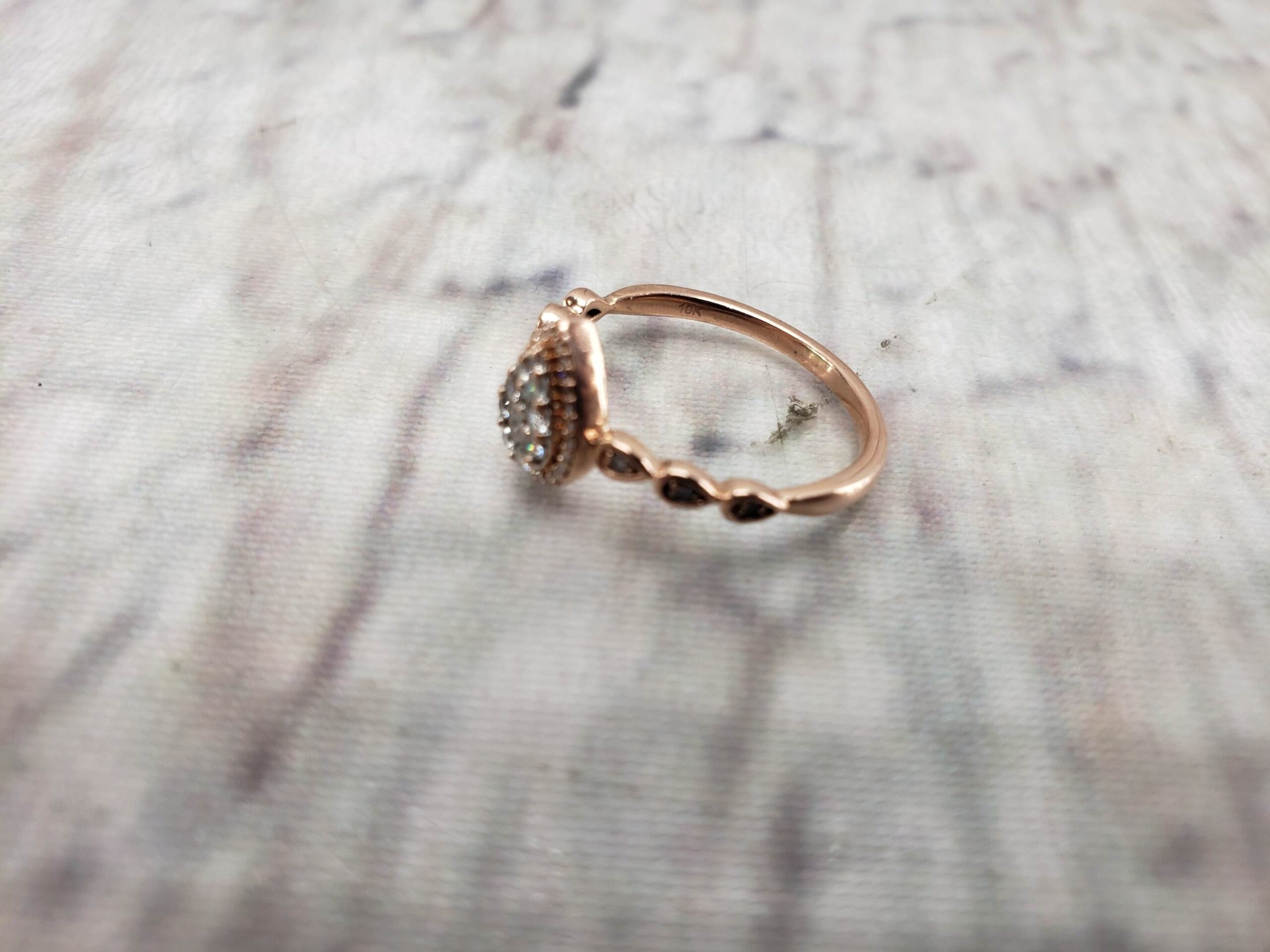 Ring RG Women Sz 7 1.20DWT 10k Rose Gold, Several Round Cut Diamonds