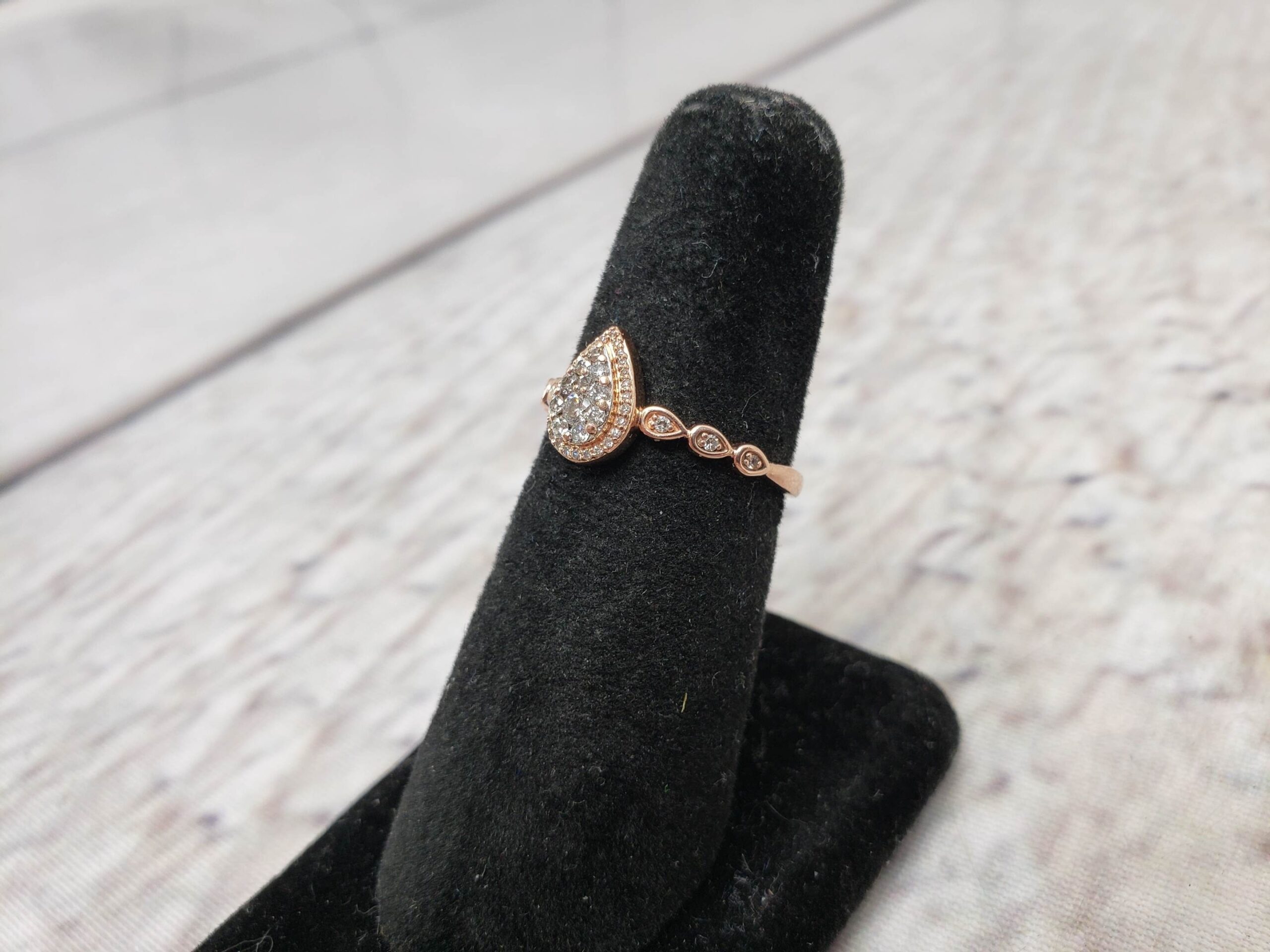 Ring RG Women Sz 7 1.20DWT 10k Rose Gold, Several Round Cut Diamonds