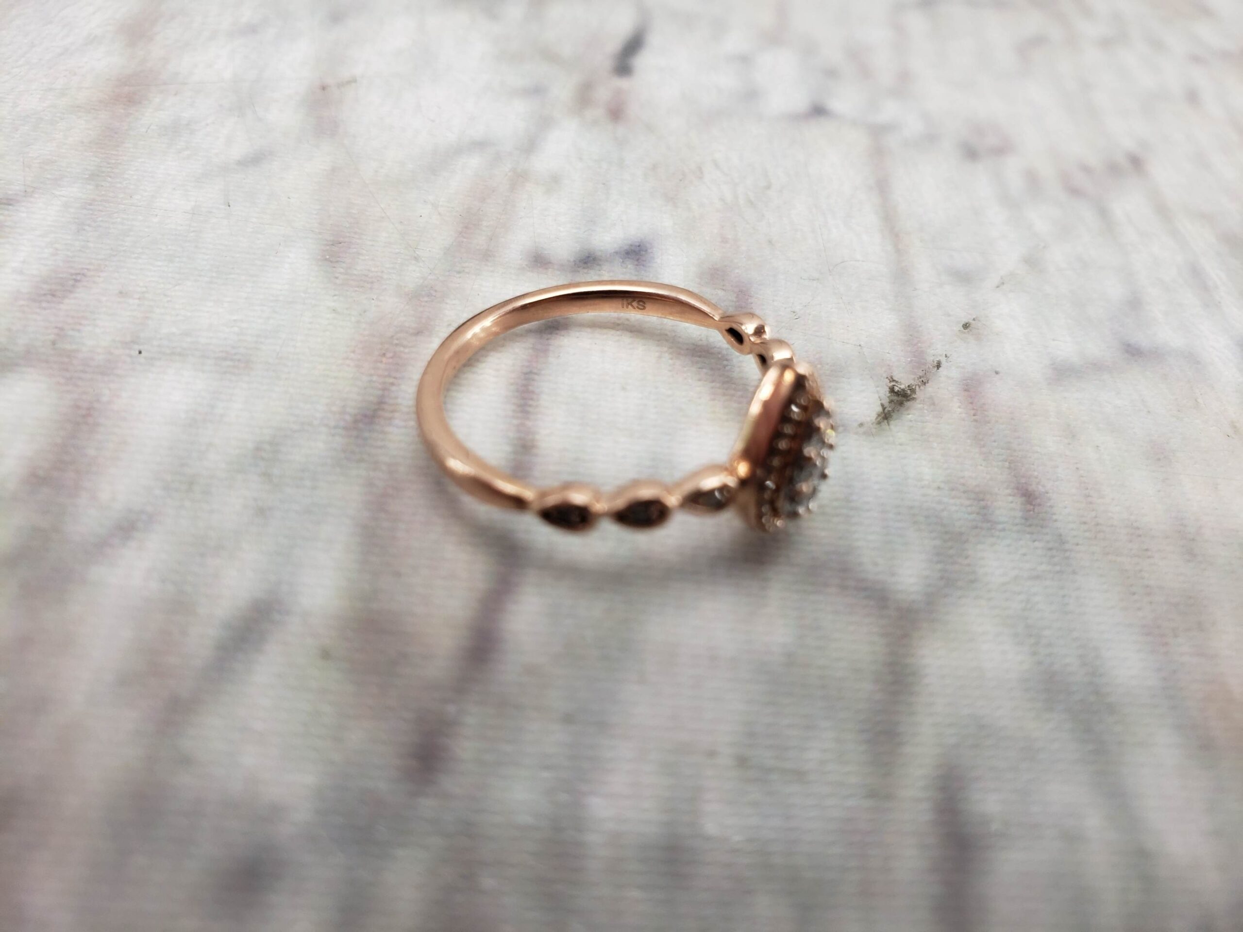 Ring RG Women Sz 7 1.20DWT 10k Rose Gold, Several Round Cut Diamonds