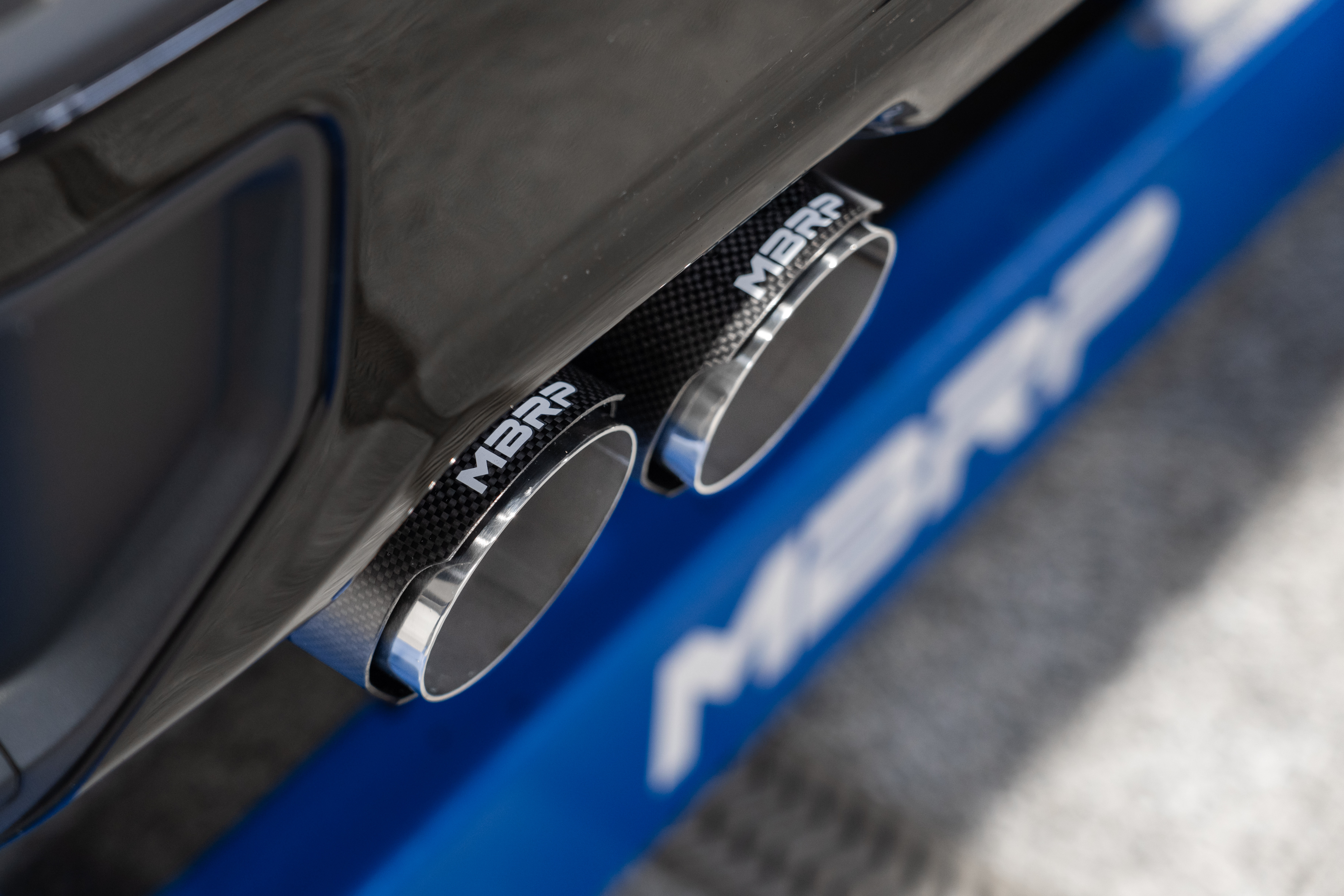 MBRP Exhaust 3in. Cat-Back. 2.5in. Dual Split Rear. T304. Quad CF Tips S50043CF