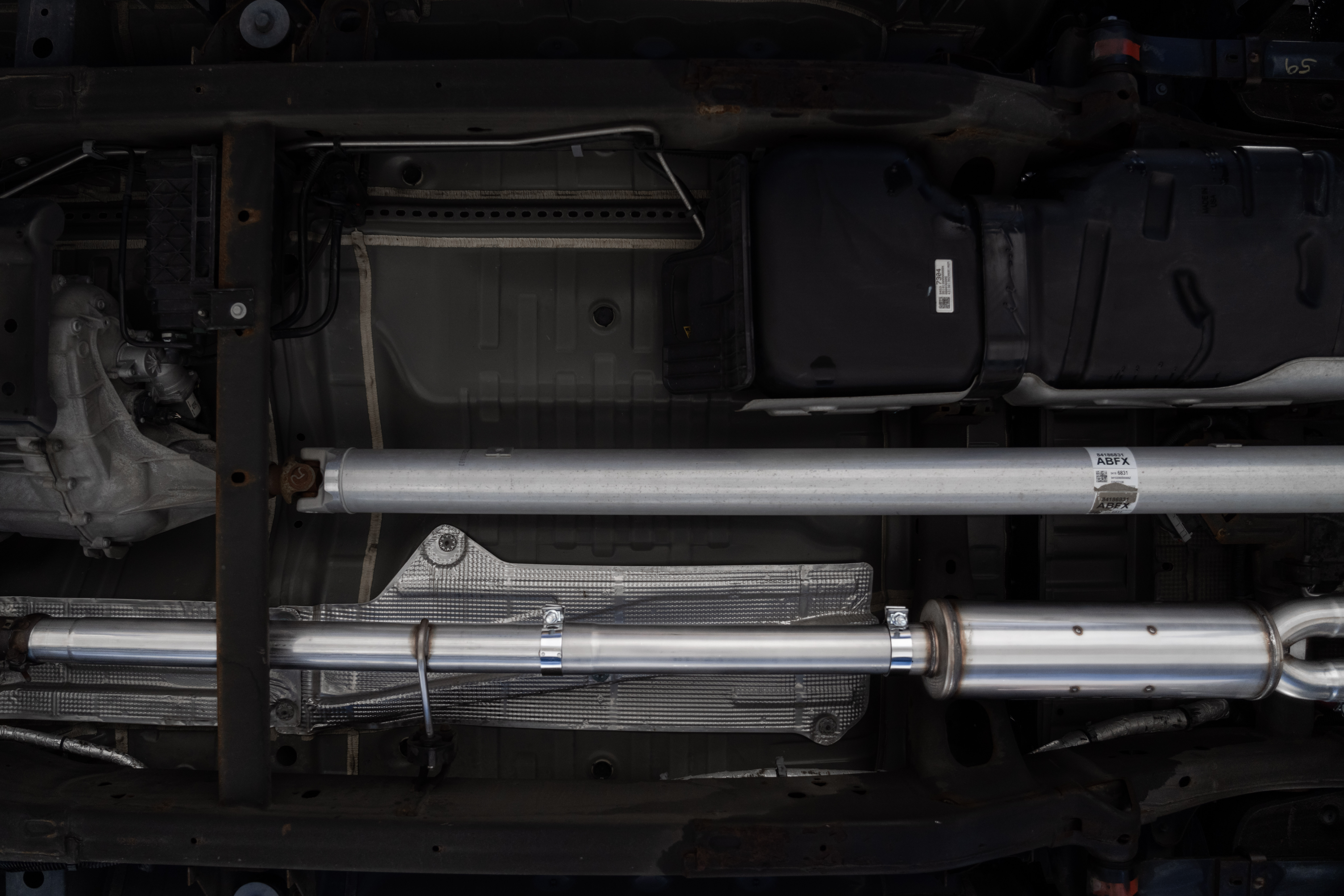 MBRP Exhaust 3in. Cat-Back. 2.5in. Dual Split Rear. T304. Quad CF Tips S50043CF