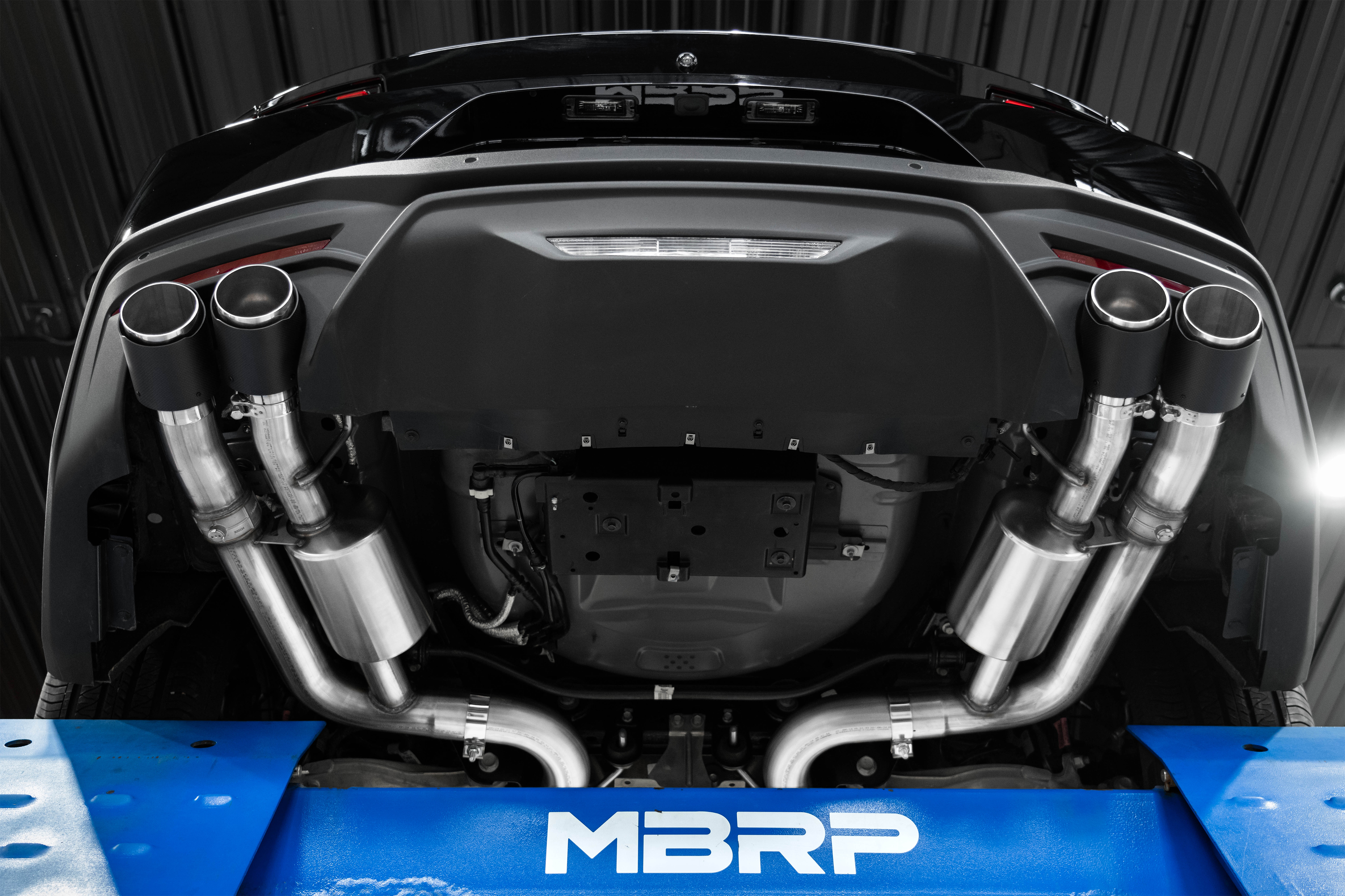 MBRP Exhaust 3 Inch Cat-Back Quad Rear Exit. T304 and CF Tips. Active Exhaust S72553CF