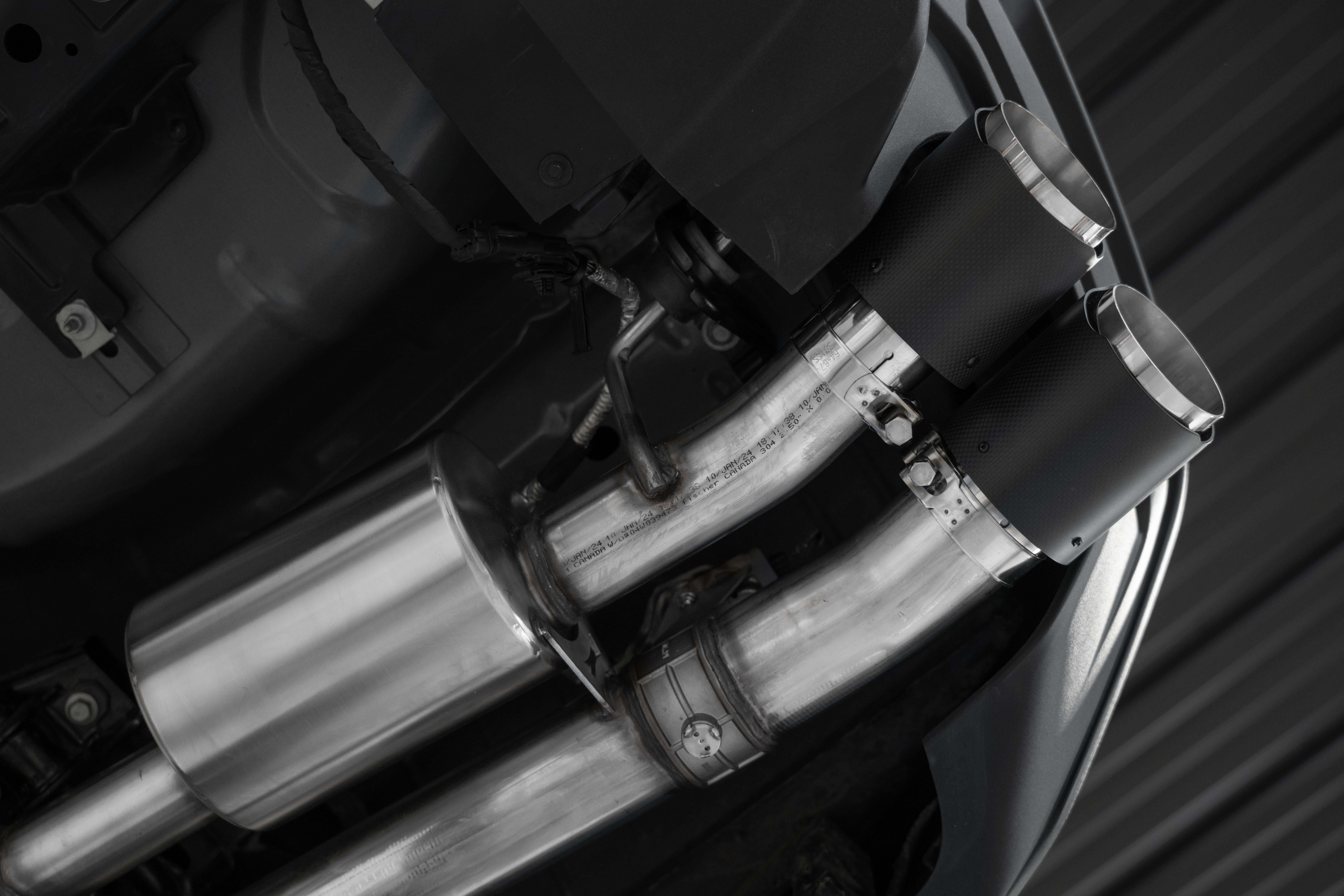 MBRP Exhaust 3 Inch Cat-Back Quad Rear Exit. T304 and CF Tips. Active Exhaust S72553CF