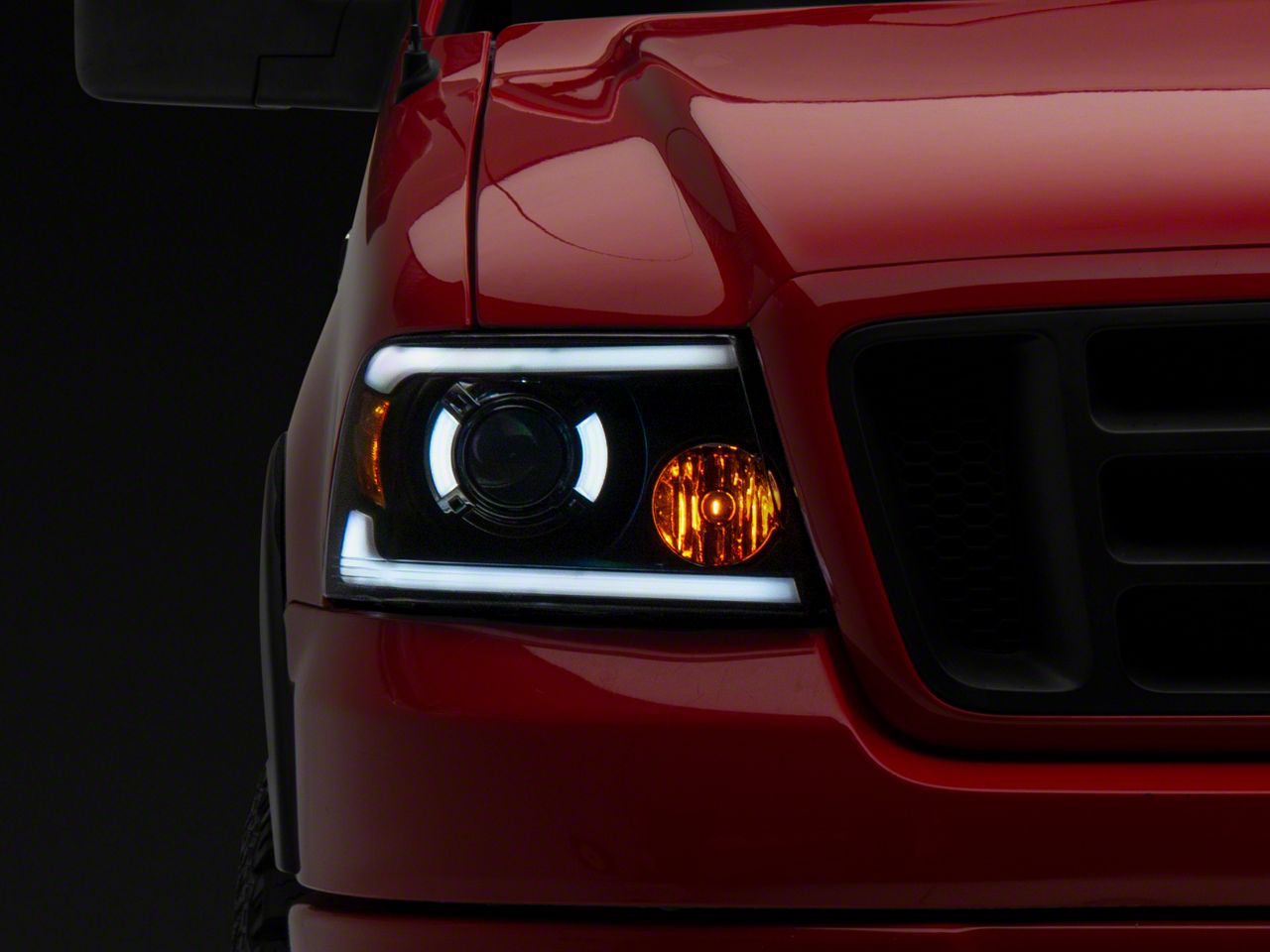 Raxiom Axial Series Projector Headlights with Sequential LED Bar T566364