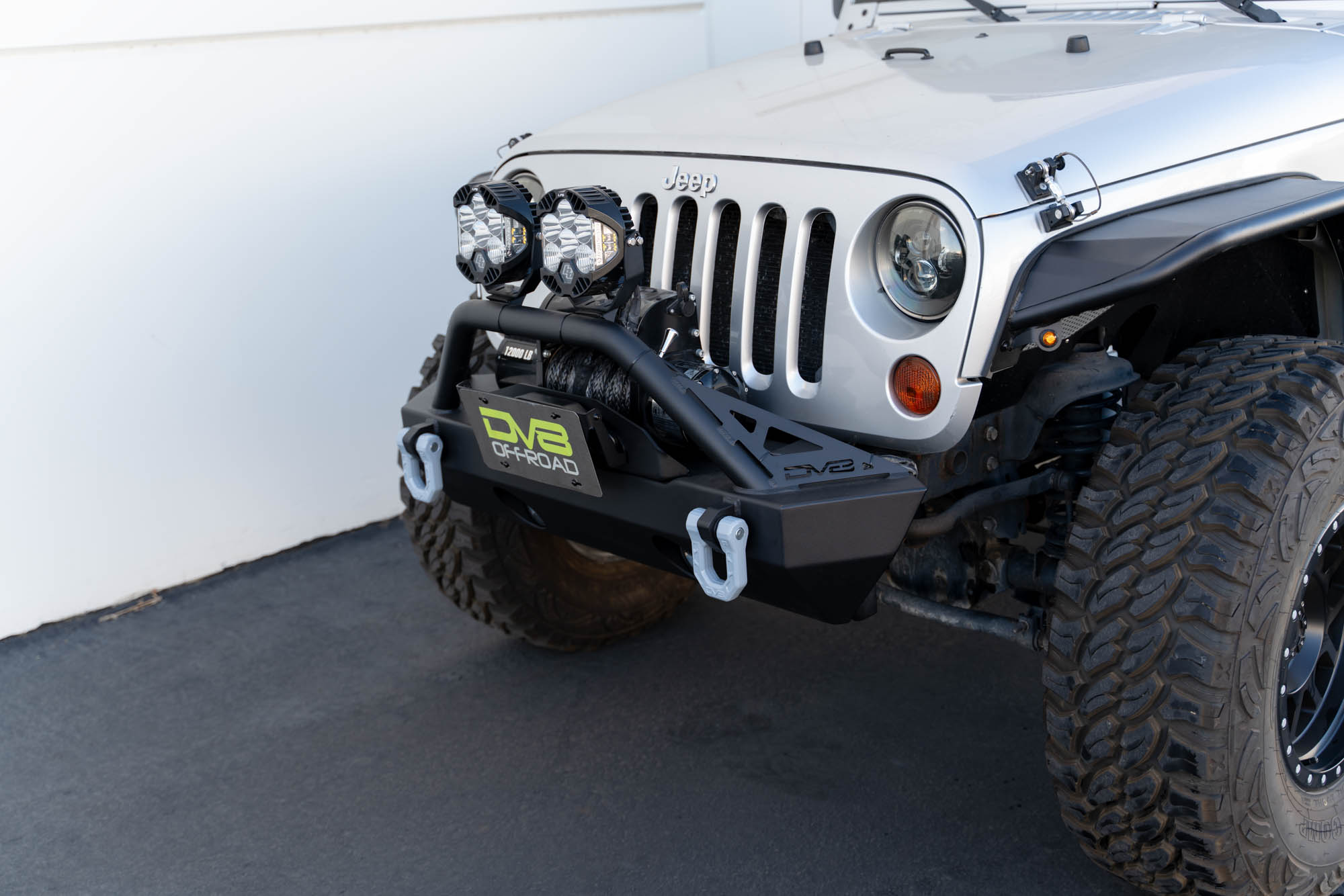 DV8 Offroad Fairlead Mounted Flip-Up License Plate Bracket LPBM-02