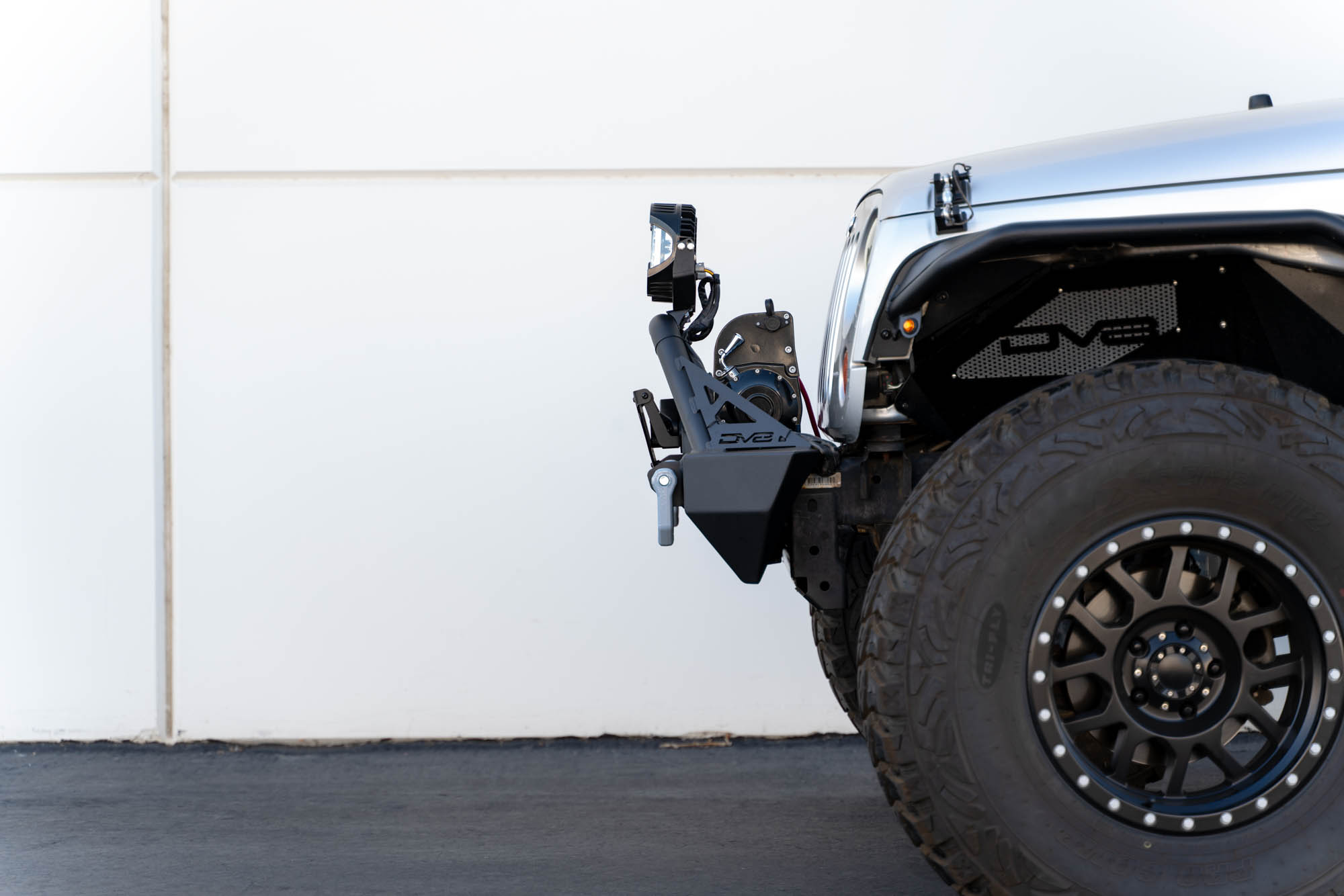 DV8 Offroad Fairlead Mounted Flip-Up License Plate Bracket LPBM-02